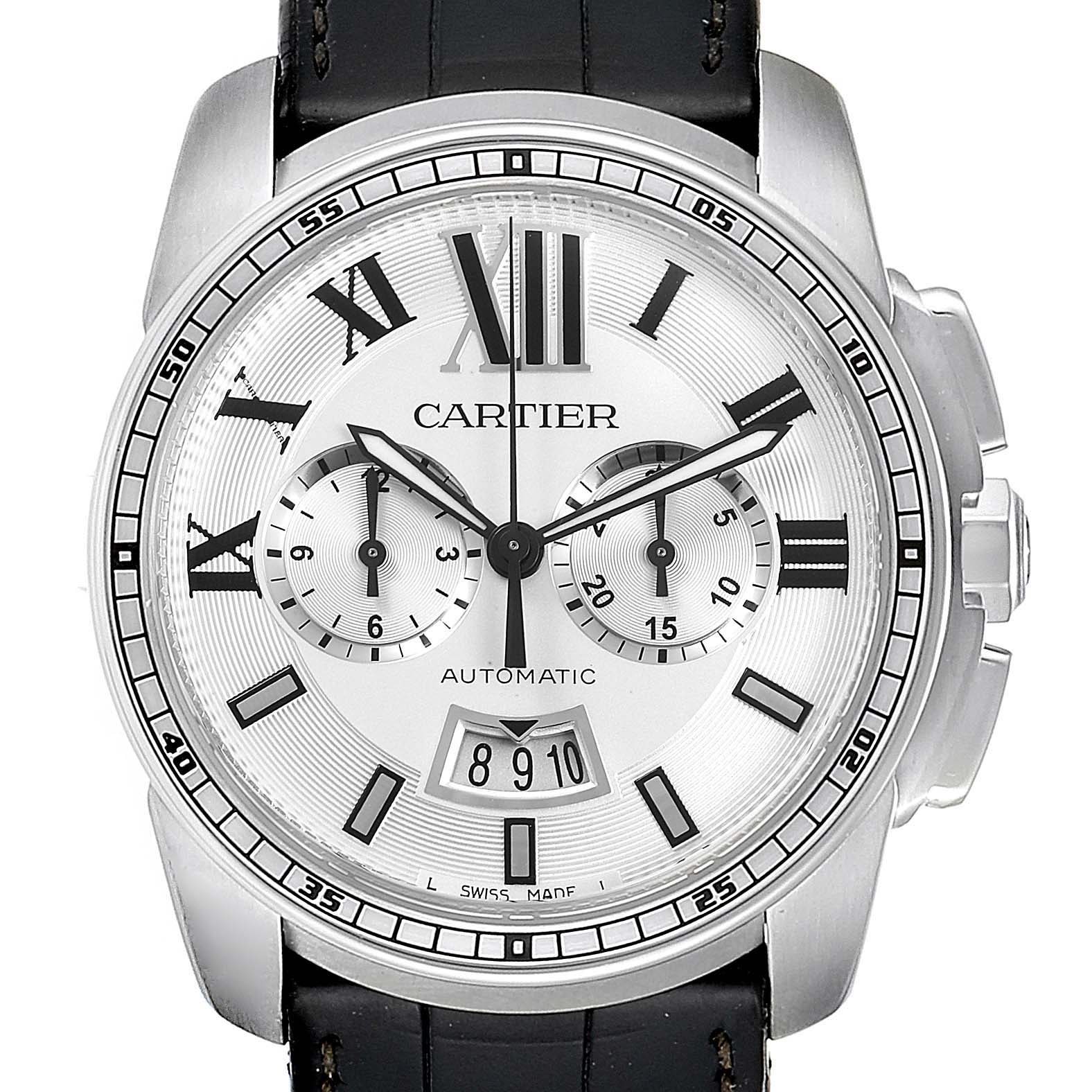The Cartier Calibre de Cartier W7100046 Men's Stainless Steel Silver Dial W7100046 Men's Stainless Steel Silver Dial watch is shown in a front-facing angle, displaying its dial, hands, subdials, and part of its leather strap.