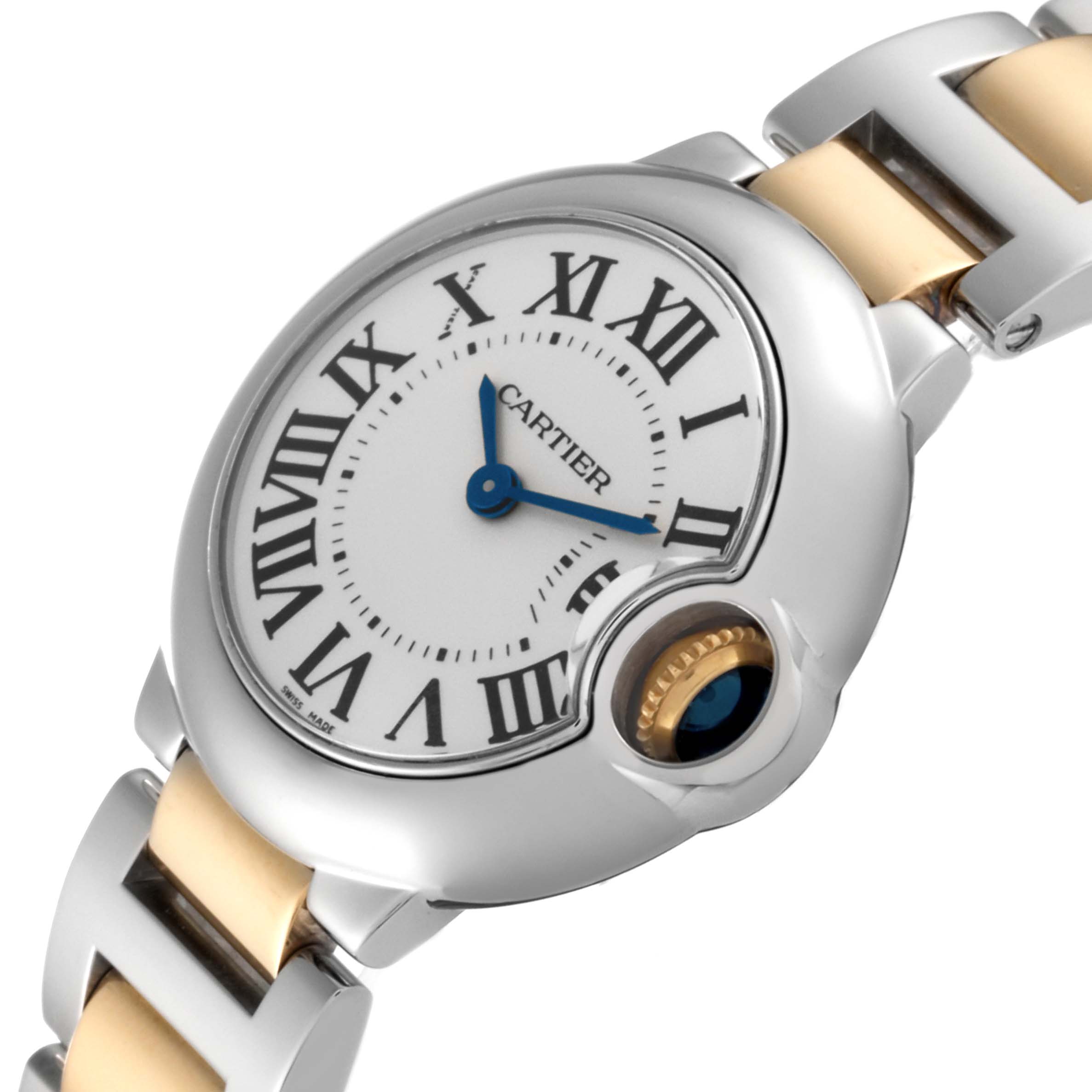 The image shows a close-up view of the Cartier Ballon Bleu W69007Z3 Women's Steel and Gold (two tone) Silver Dial W69007Z3 Women's Steel and Gold (two tone) Silver Dial watch, featuring its face, crown, and part of the bracelet.