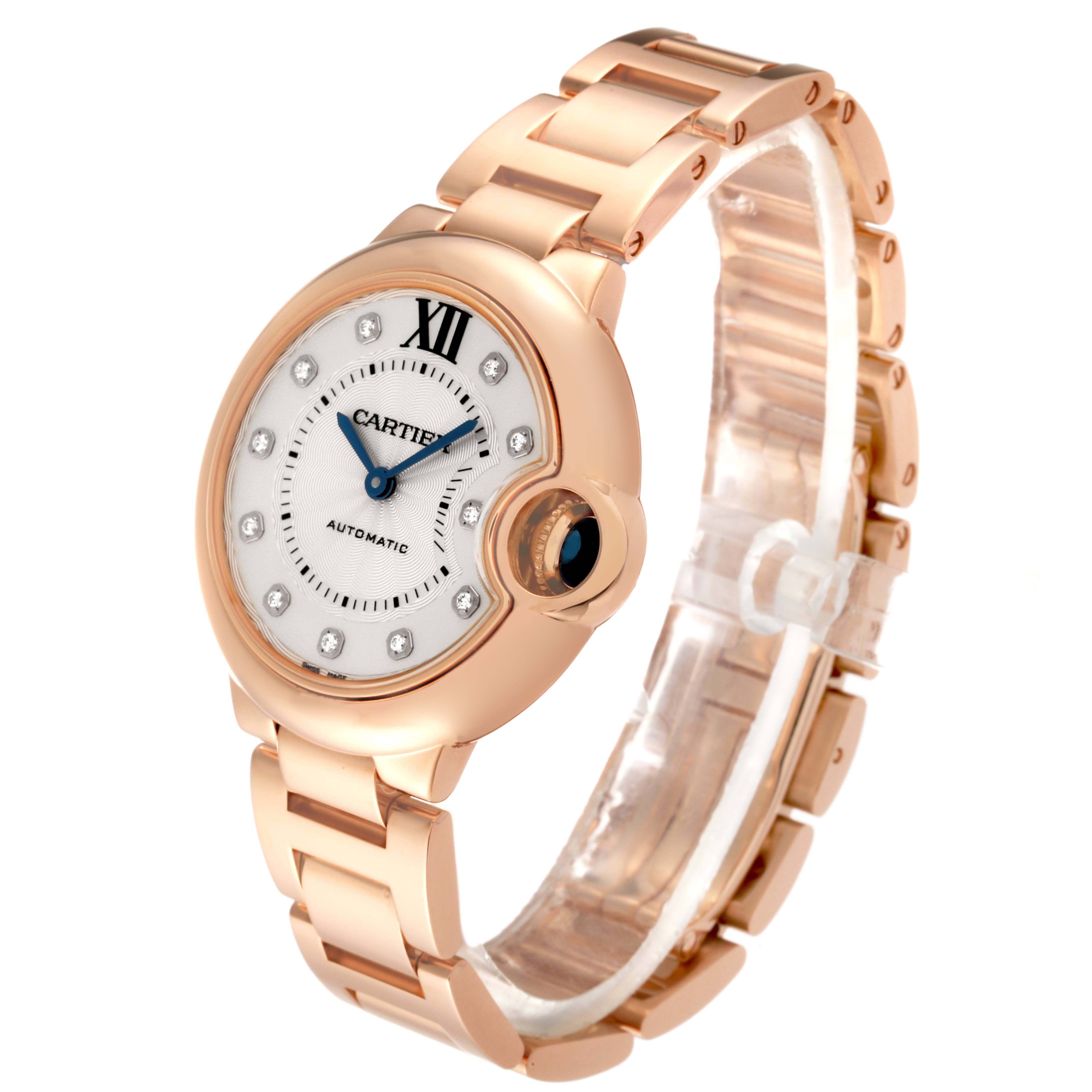 The image shows a Cartier Ballon Bleu WE902062 Women's Rose Gold Silver Dial WE902062 Women's Rose Gold Silver Dial watch, angled to display the face, bezel, crown, and part of the link bracelet.