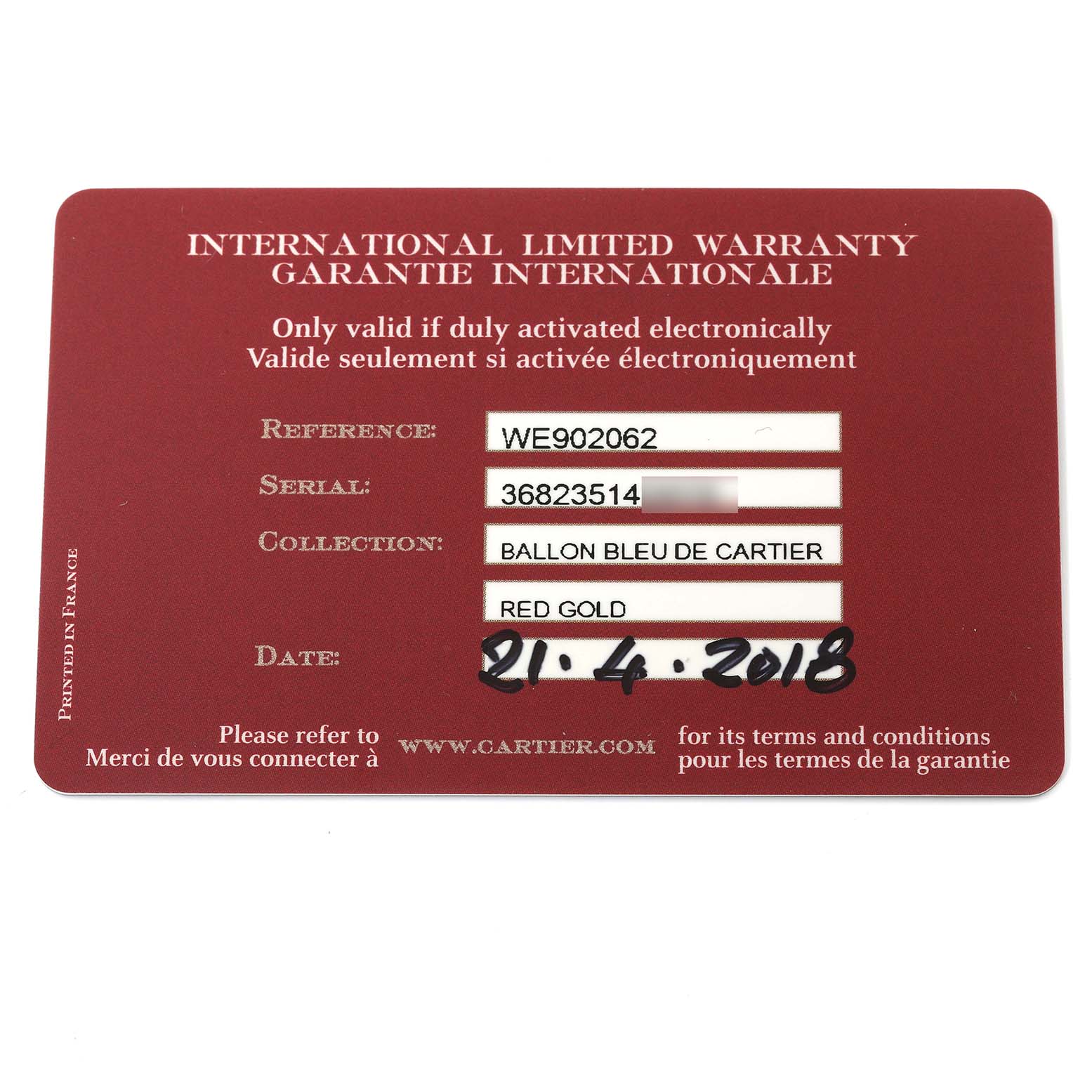 The image shows an international limited warranty card for the Ballon Bleu de Cartier watch.