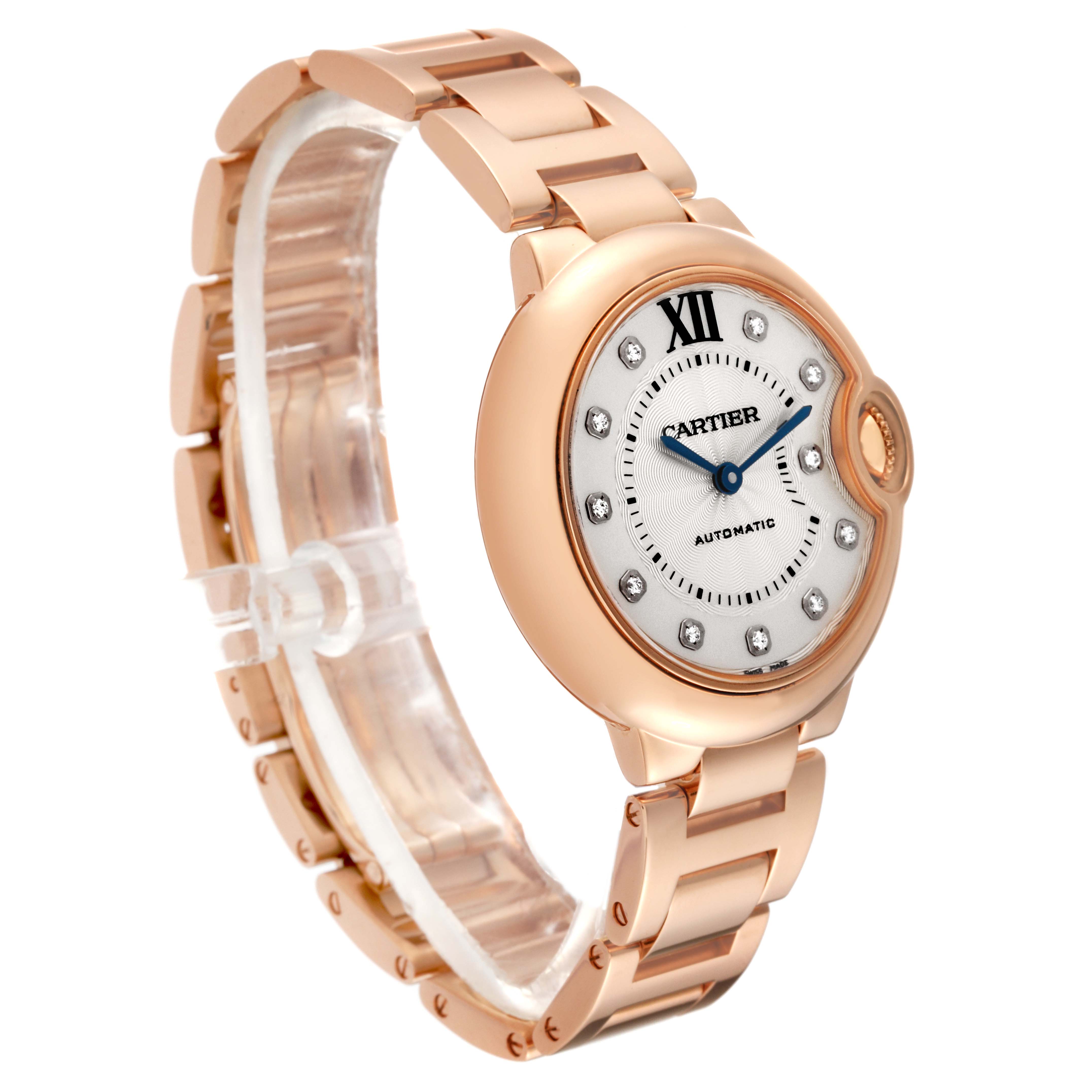 The image shows a Cartier Ballon Bleu WE902062 Women's Rose Gold Silver Dial WE902062 Women's Rose Gold Silver Dial watch at an angle highlighting the face, bezel, and rose gold bracelet.