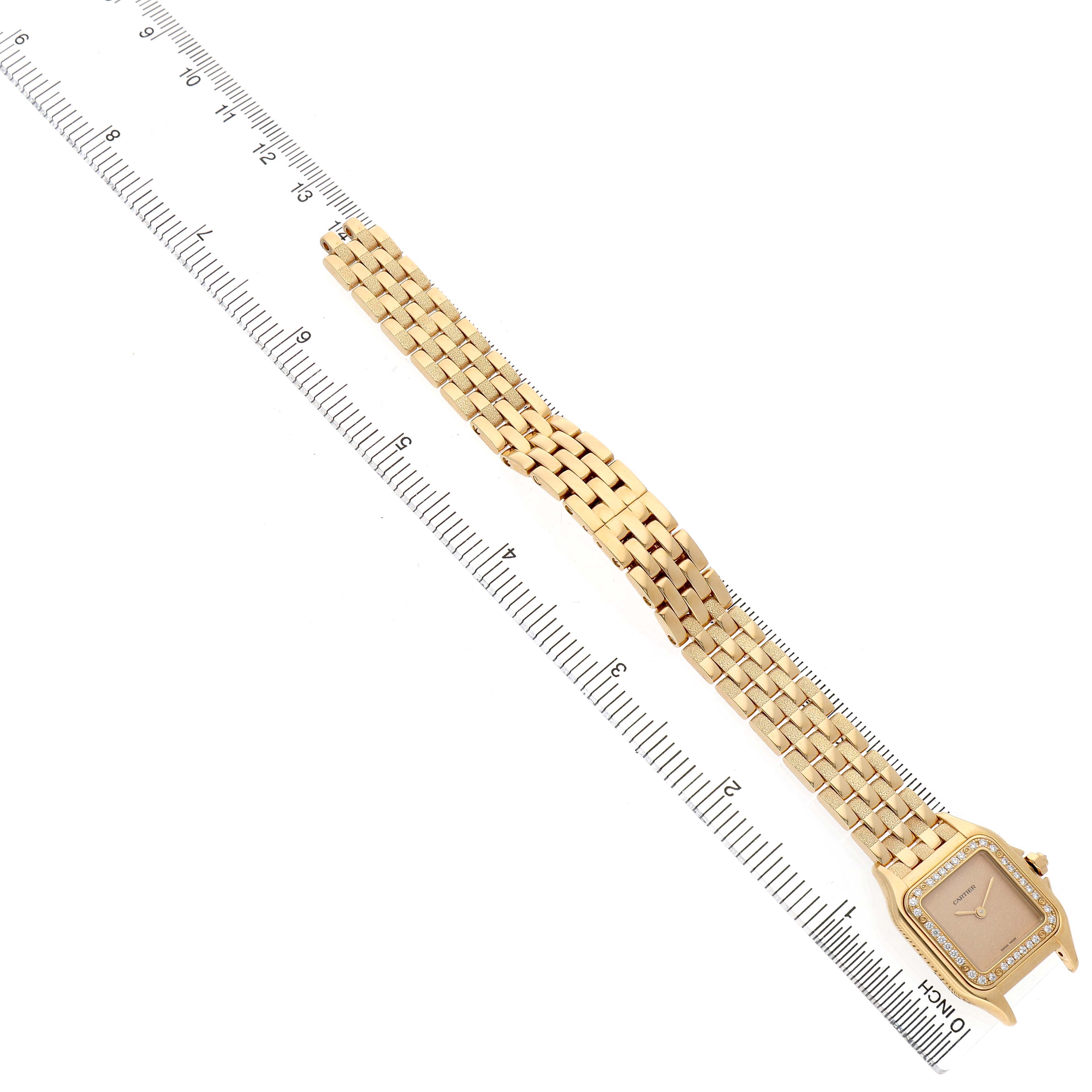 The Cartier Panthere WJPN0057 Women's Yellow Gold Yellow Dial watch is shown from a top view, highlighting the gold bracelet and diamond-encrusted square face.