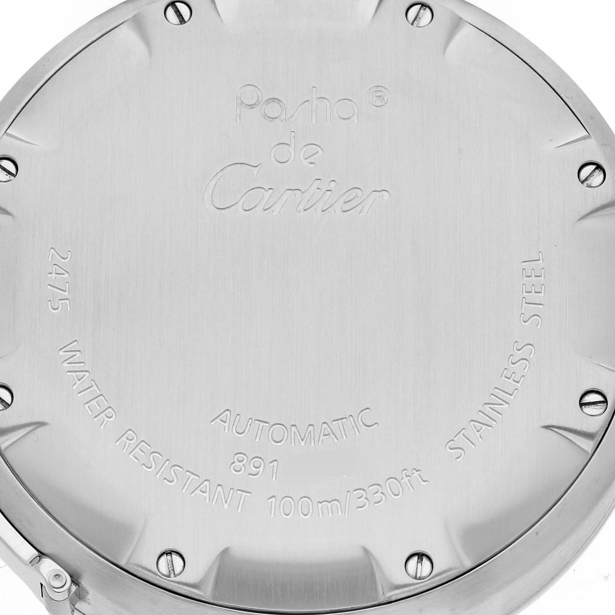 This image shows the stainless steel case back of a Cartier Pasha W31044M7 Men's Stainless Steel White Dial W31044M7 Men's Stainless Steel White Dial model watch, featuring engraved details about the watch's specifications.