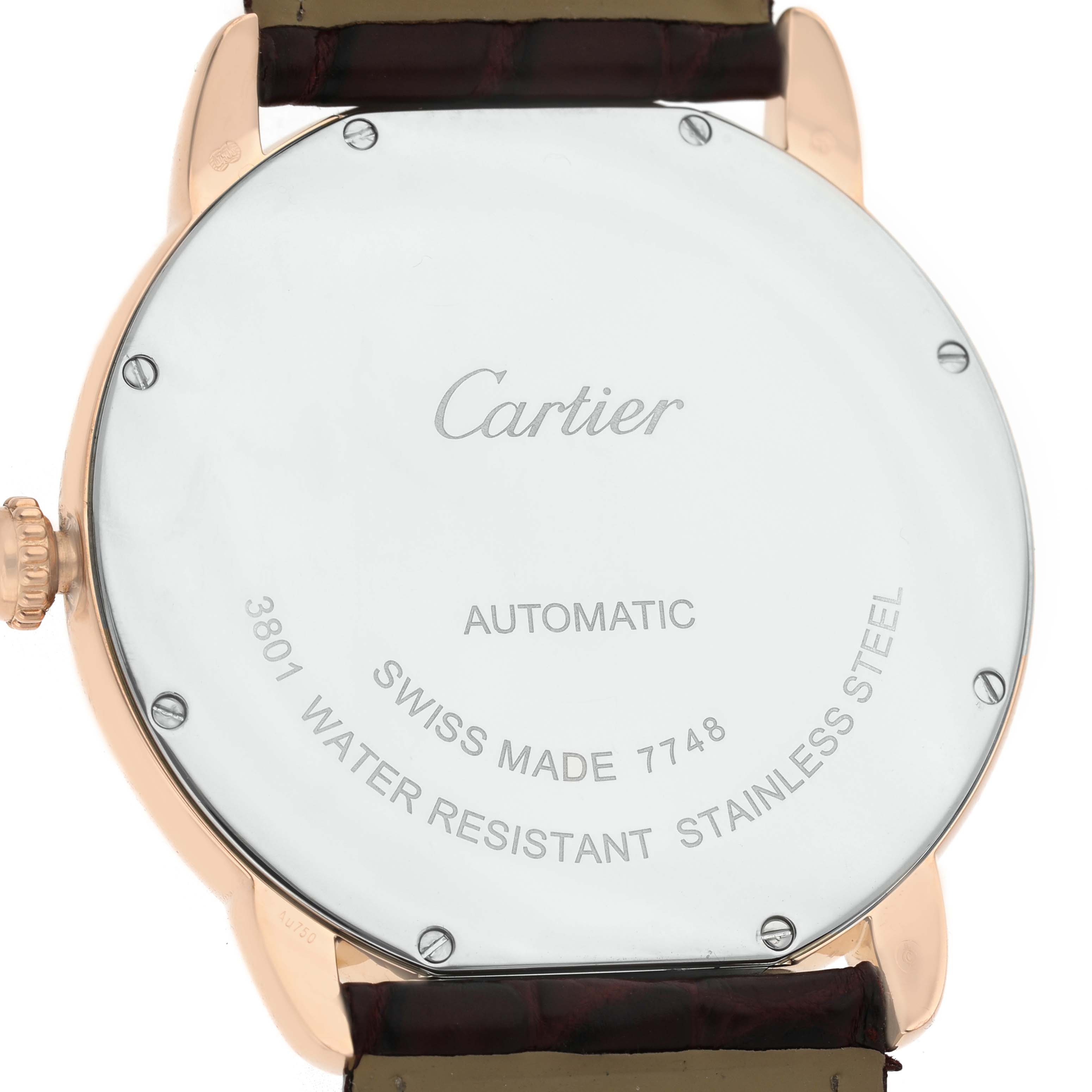 The image shows the back of a Cartier Ronde W6701009 Men's Steel and Gold (two tone) Silver Dial watch, featuring inscriptions and a leather strap attachment.