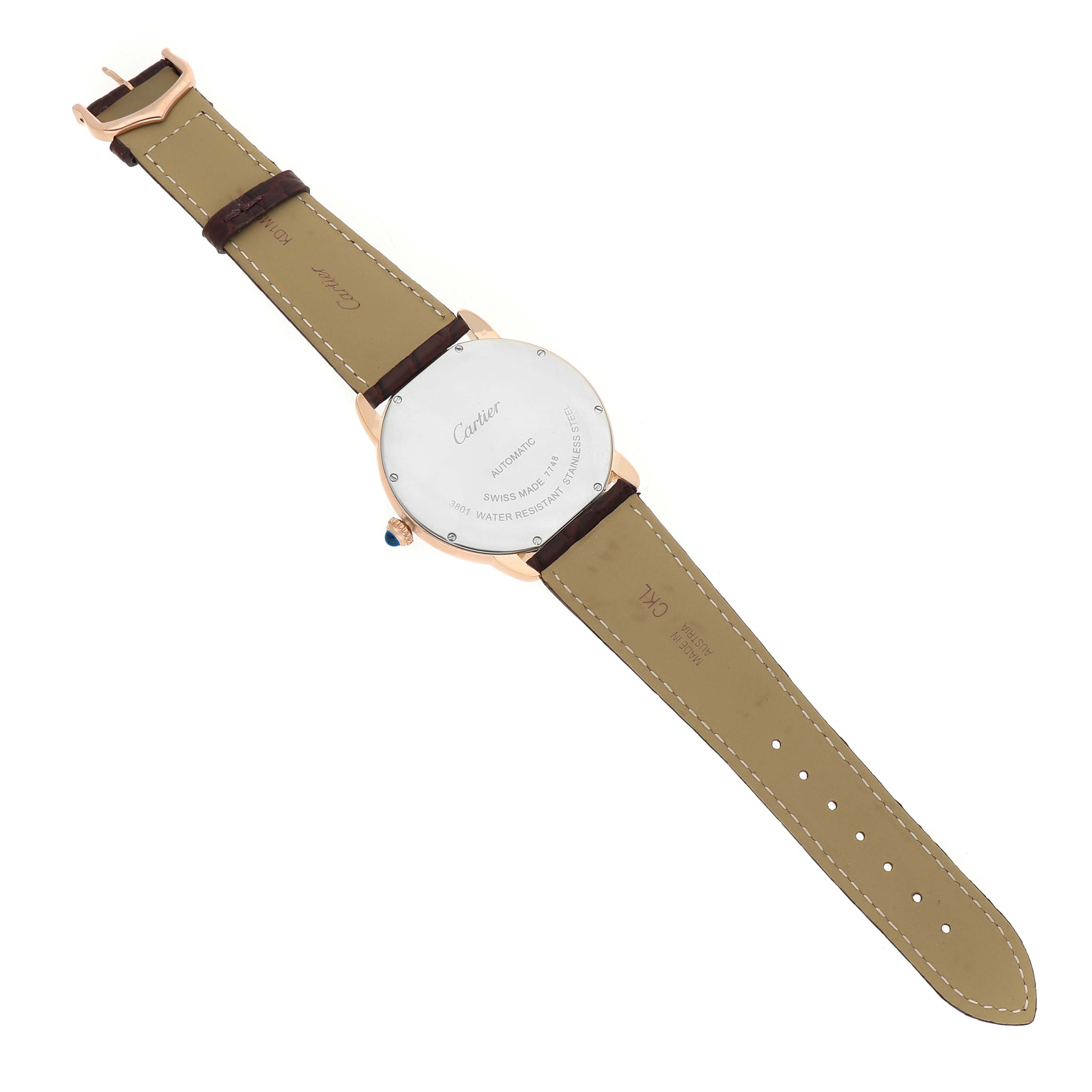 The Cartier Ronde W6701009 Men's Steel and Gold (two tone) Silver Dial watch is shown from the back, displaying the leather strap and case back details.