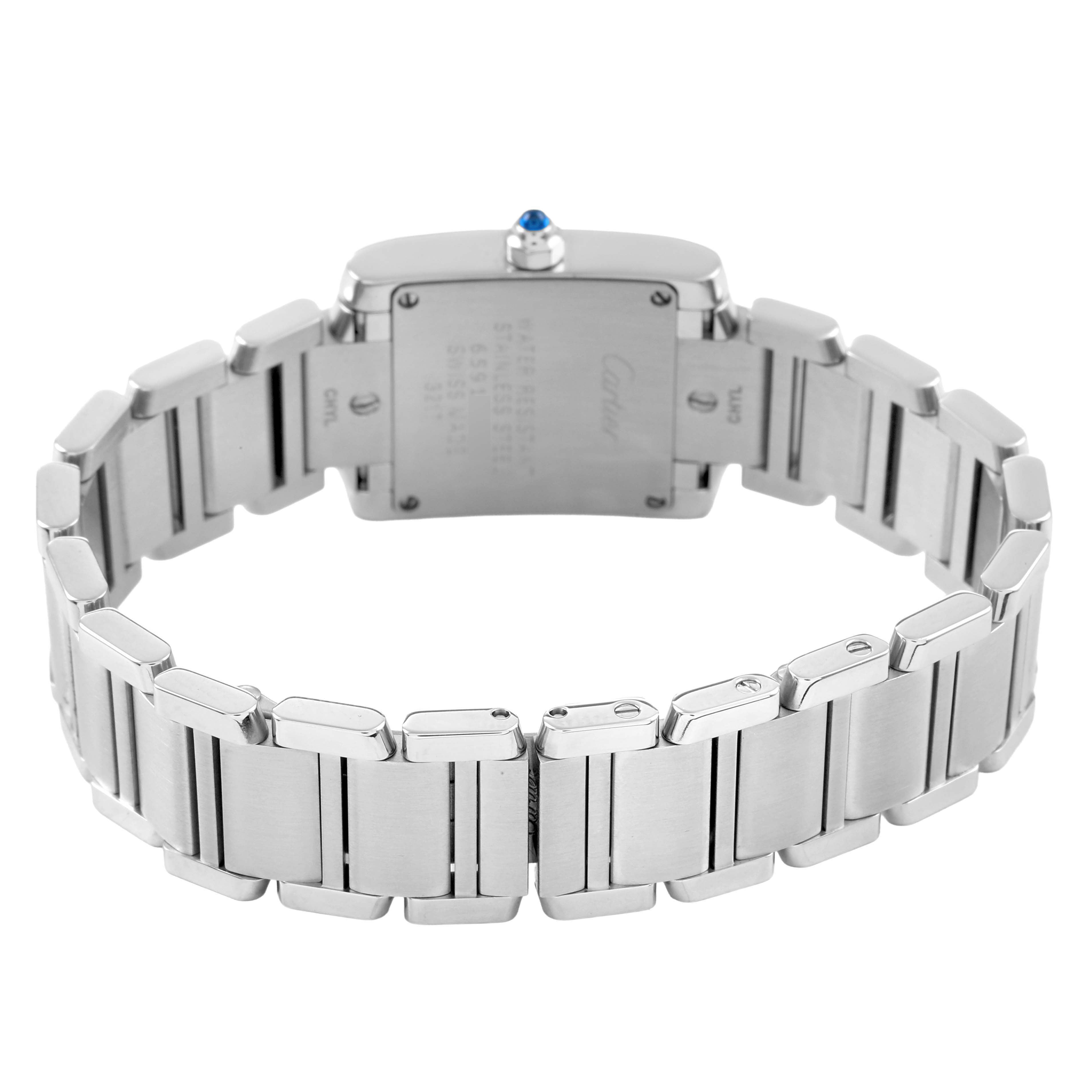 The Cartier Tank Française watch is shown from the back, displaying the stainless steel bracelet and case back with a blue crown.