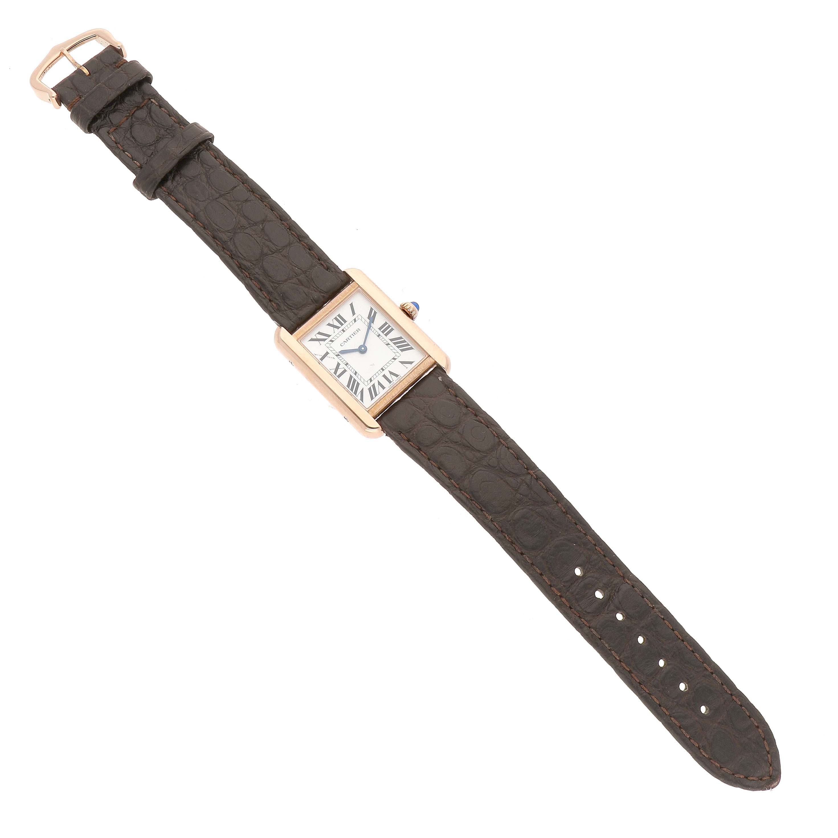 The Cartier Tank Solo W5200024 Women's Steel and Gold (two tone) Silver Dial watch is shown from a top view, displaying its rectangular face and leather strap.