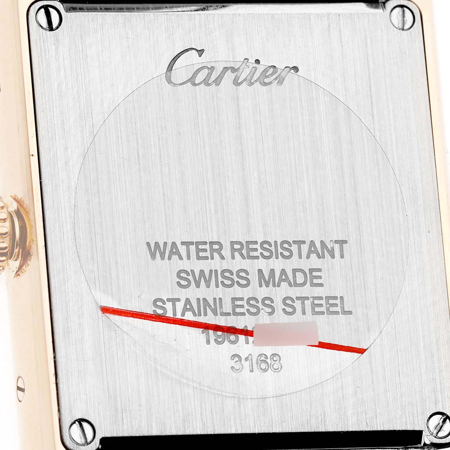 The image shows the back case of a Cartier Tank Solo W5200024 Women's Steel and Gold (two tone) Silver Dial watch, displaying branding and specifications.