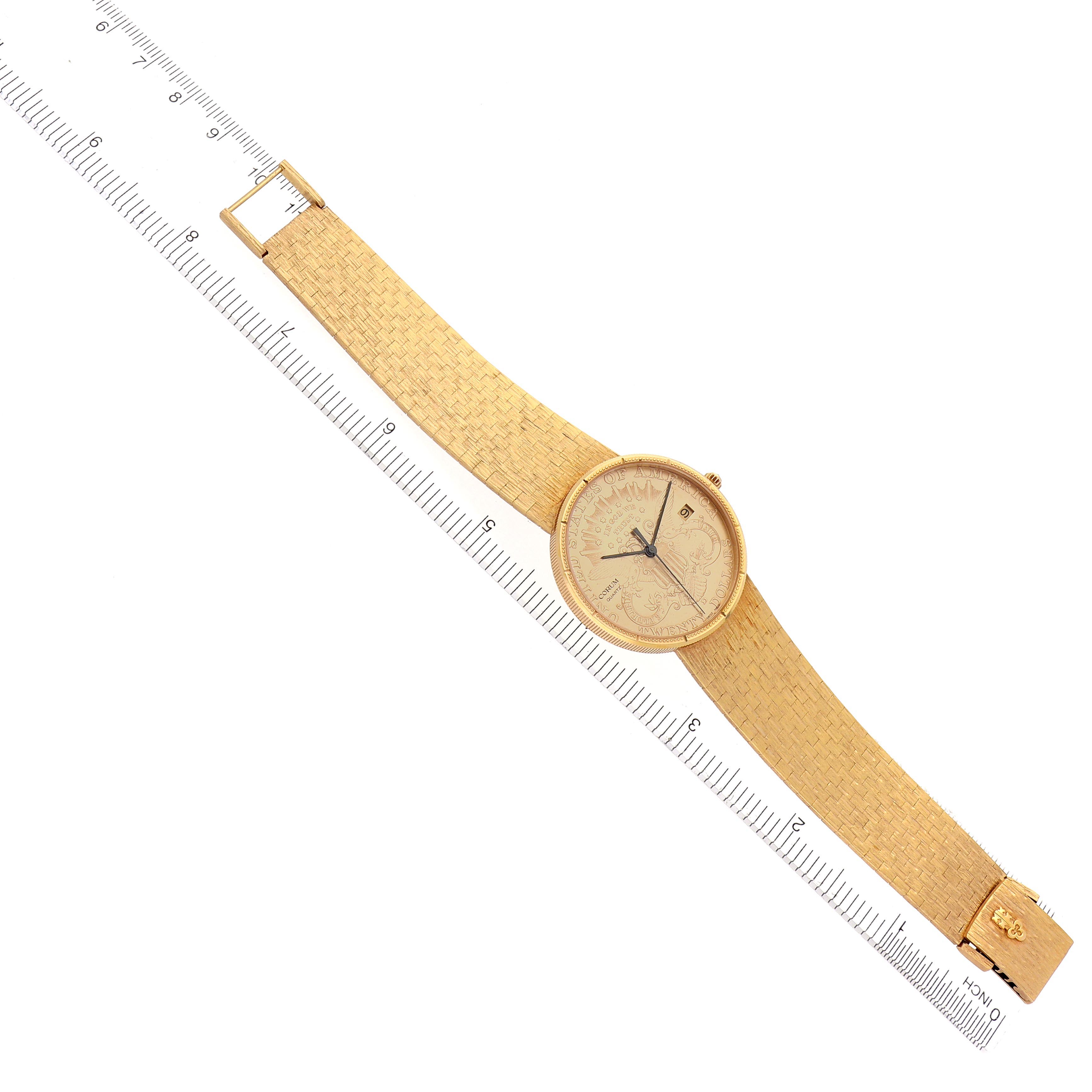 The Corum Coin Watch Men's Yellow Gold Champagne Dial Men's Yellow Gold Champagne Dial is shown from a top-down angle, displaying the entire case, dial, and full length of the strap.