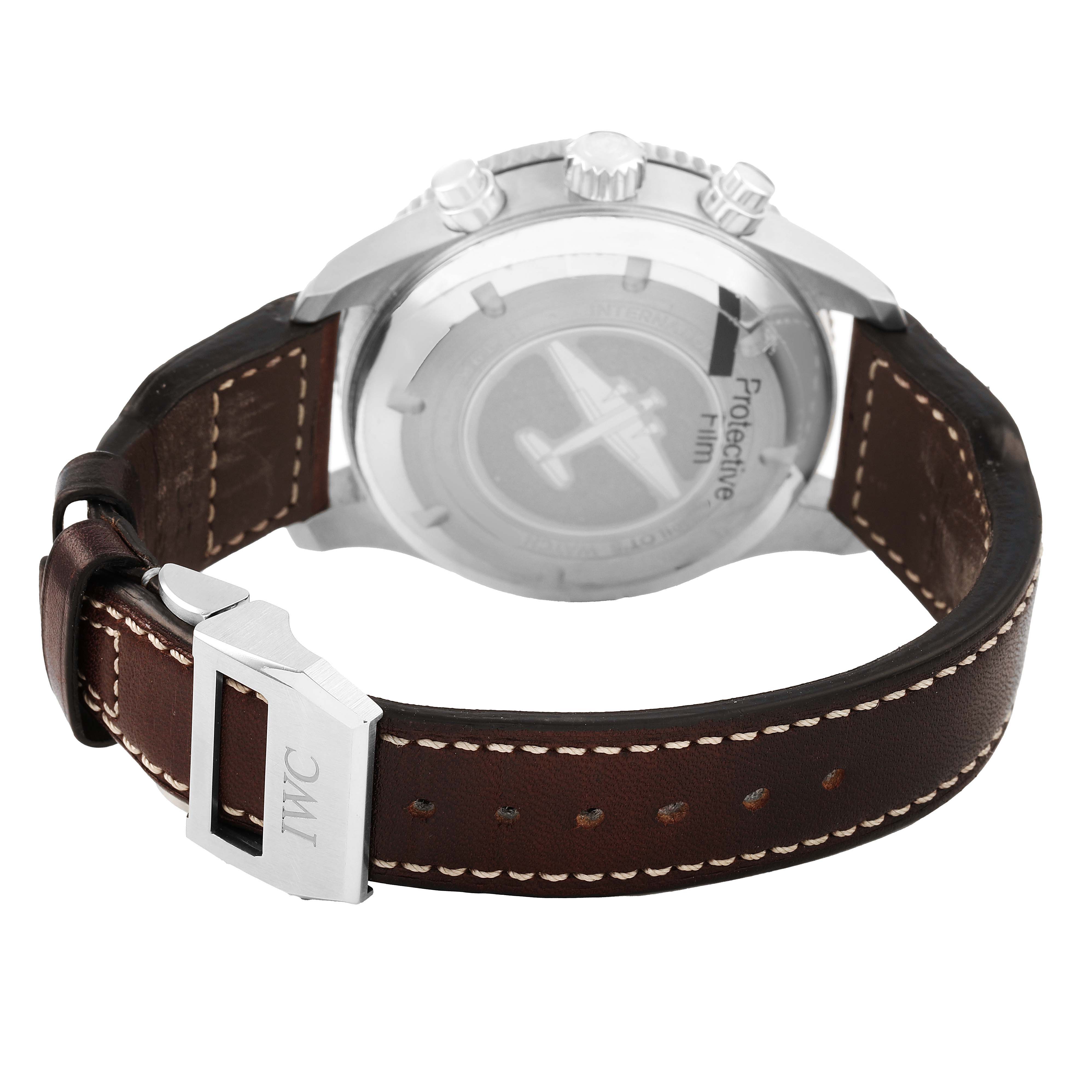 The image shows the back of an IWC Pilot IW395001 Men's Stainless Steel Black Dial model watch, highlighting the case back, crown, and leather strap with buckle.