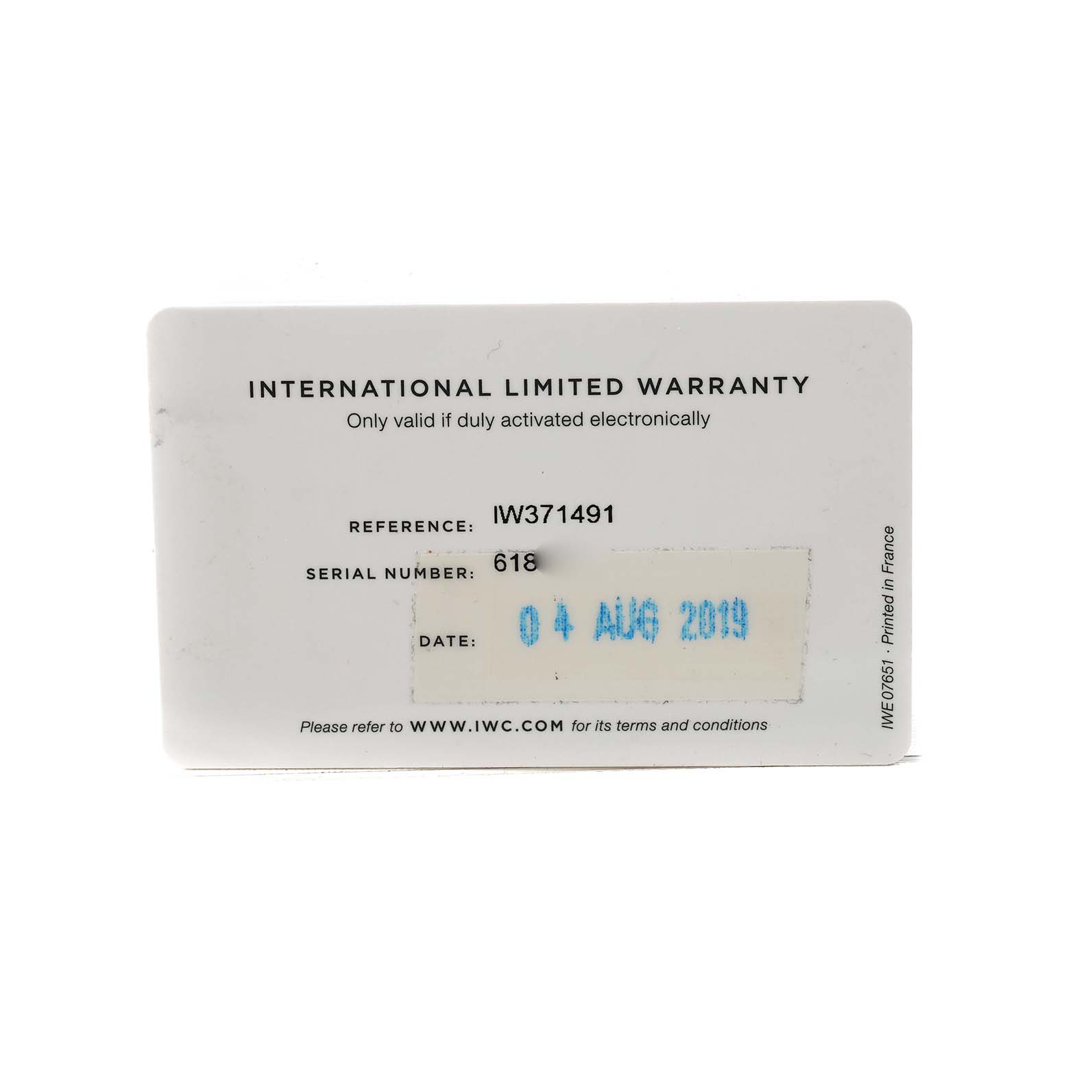 The image shows the warranty card for the IWC Portuguese IW371491 Men's Stainless Steel Blue Dial model, displaying the reference and serial number.