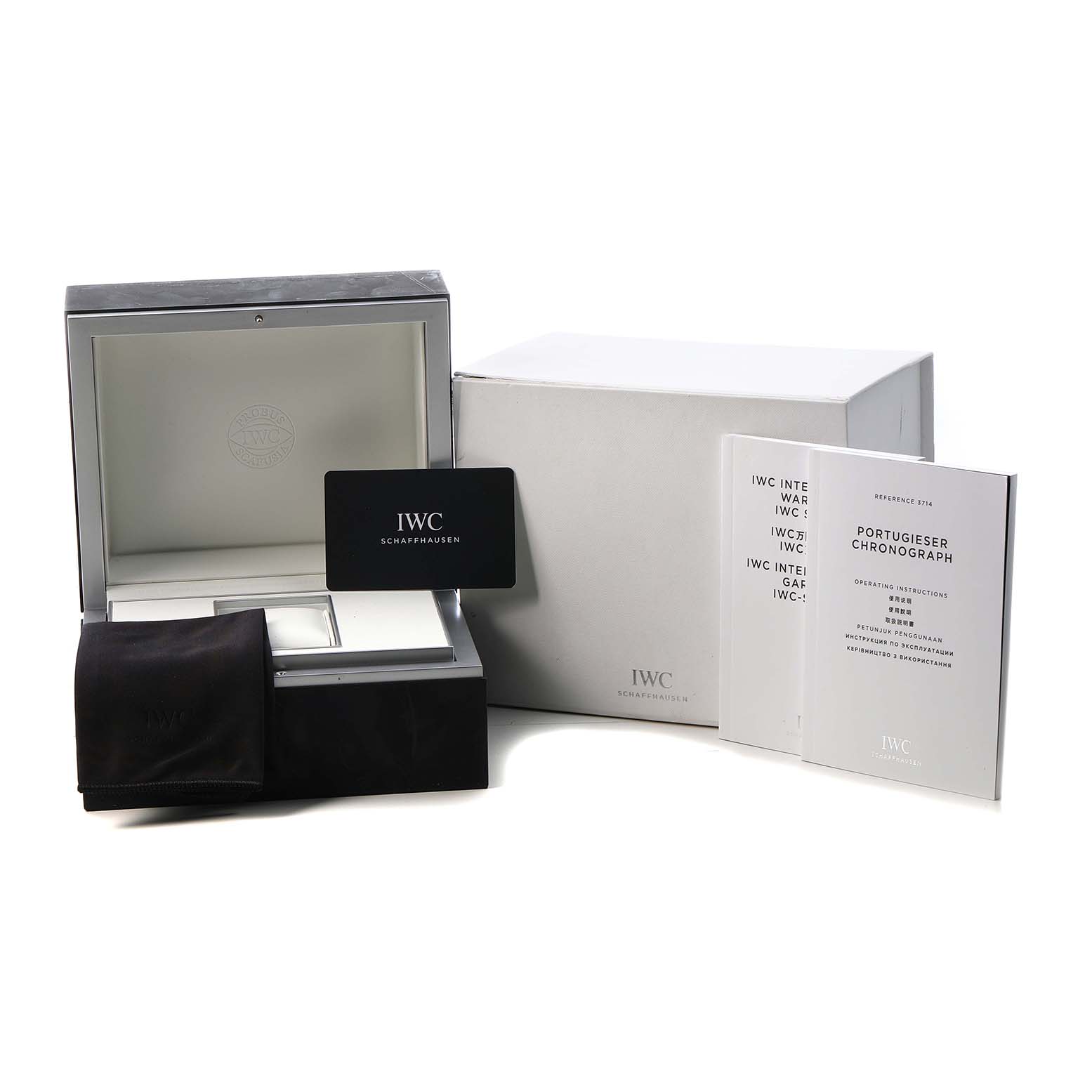 The image shows the IWC Portuguese IW371491 Men's Stainless Steel Blue Dial watch's box, warranty card, cloth, and manuals from a front angle.