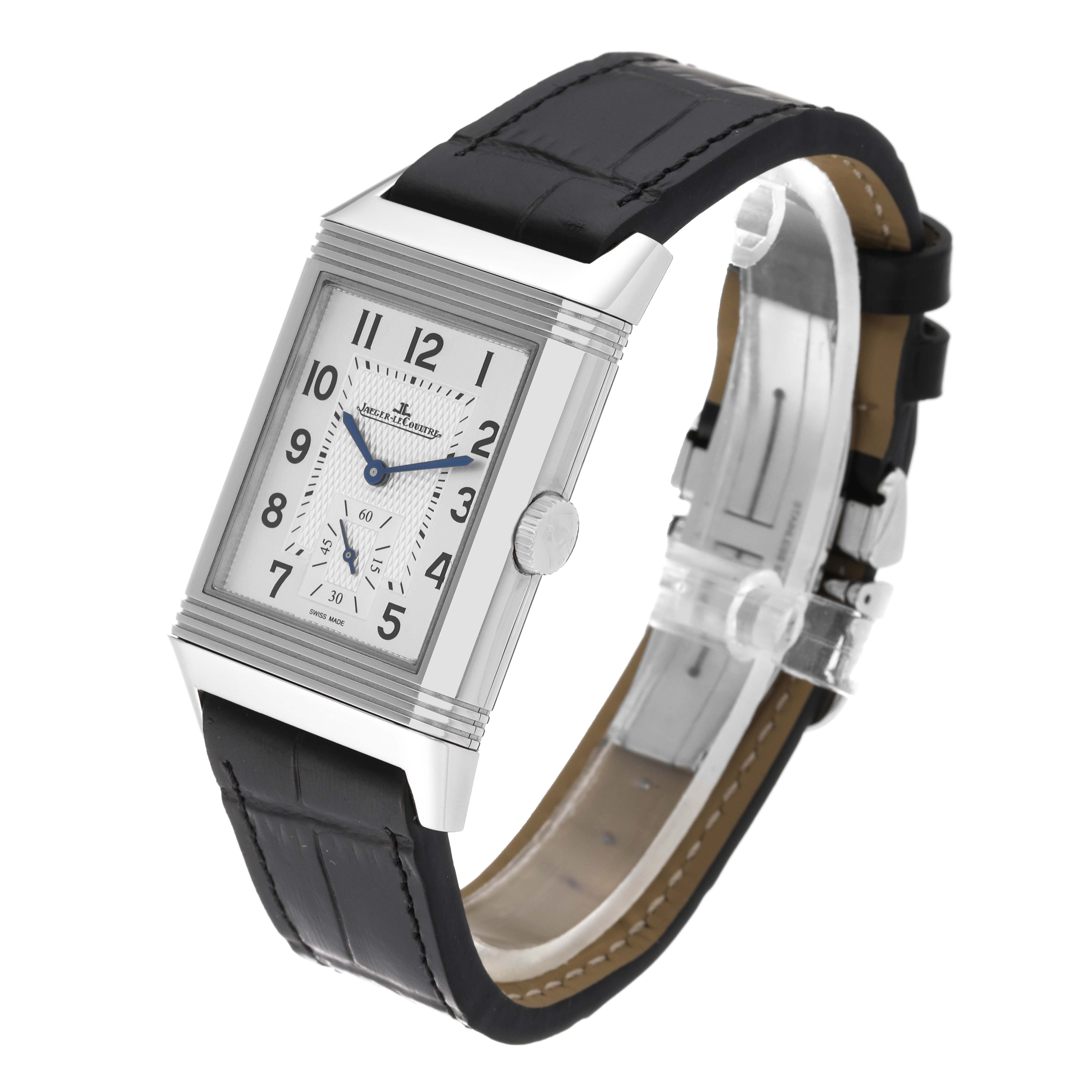 The image shows a Jaeger-LeCoultre Reverso watch from a front angle, highlighting its rectangular face and black leather strap.