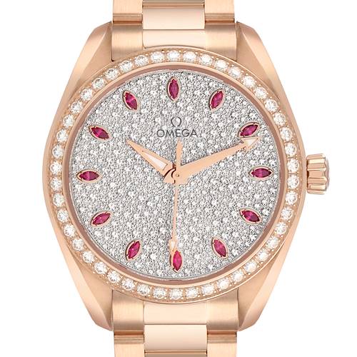 The Omega 220.55.34.20.99.001 Women's Rose Gold Silver Dial Aqua Terra 34 Rose Gold Diamond Ruby watch is shown from the front, highlighting its ruby markers, diamond bezel, and rose gold case.
