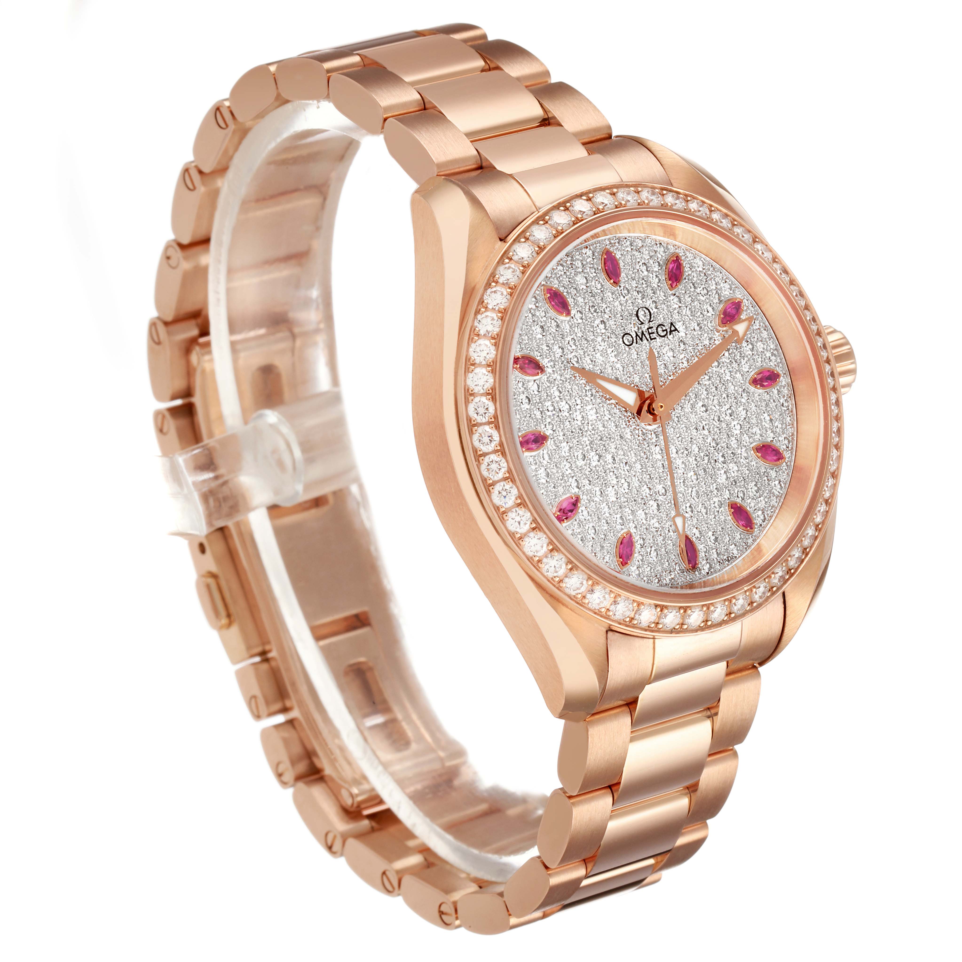 The Omega 231.15.34.20.55.002 Women's Rose Gold Silver Dial Aqua Terra 34 Rose Gold Diamond Ruby Ladies watch is shown at a three-quarter angle, displaying its case, bracelet, and dial.