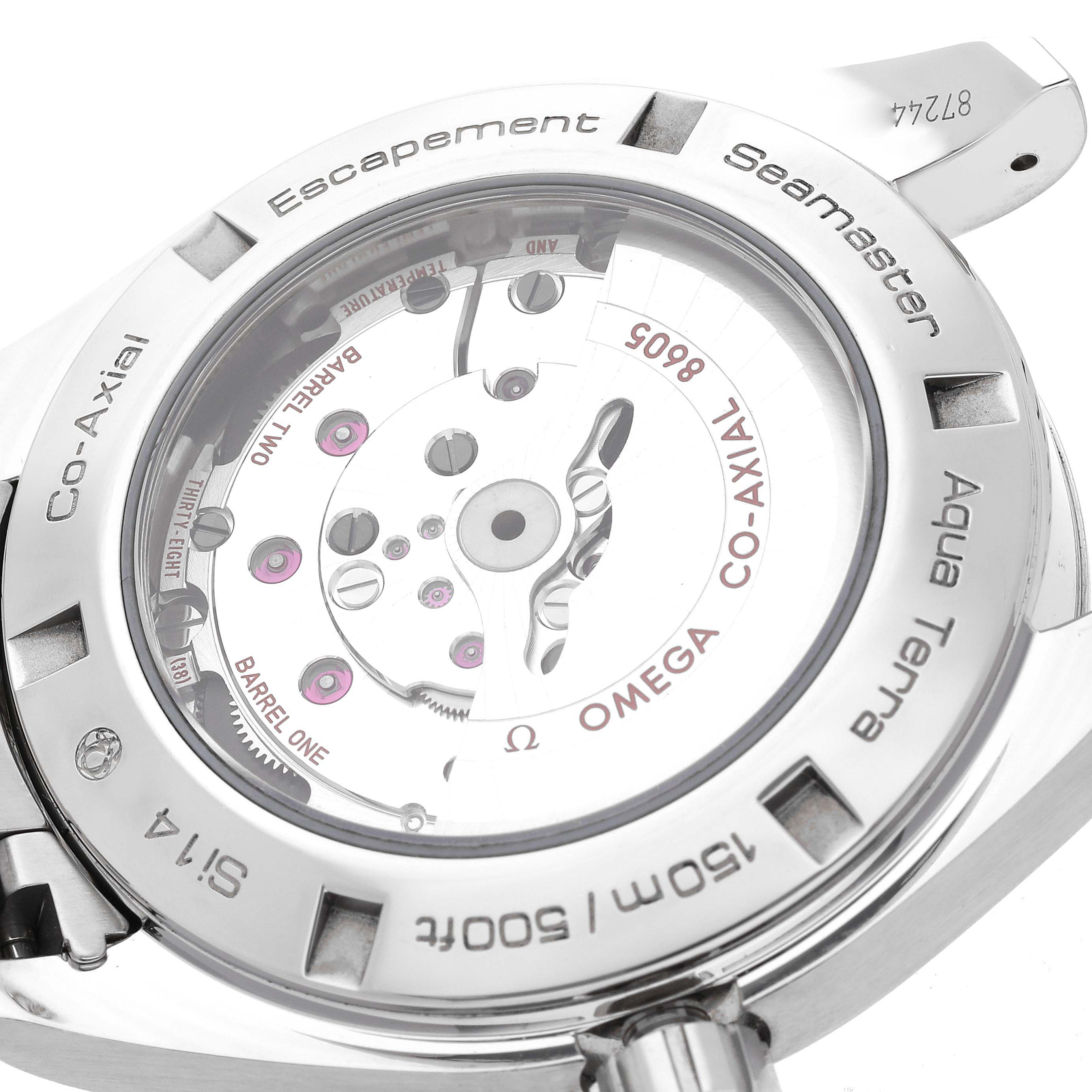 The image shows the back view of an Omega Aqua Terra 231.10.43.22.03.001 Men's Stainless Steel Blue Dial 231.10.43.22.03.001 Men's Stainless Steel Blue Dial watch, highlighting the watch's intricate internal movement and engravings.