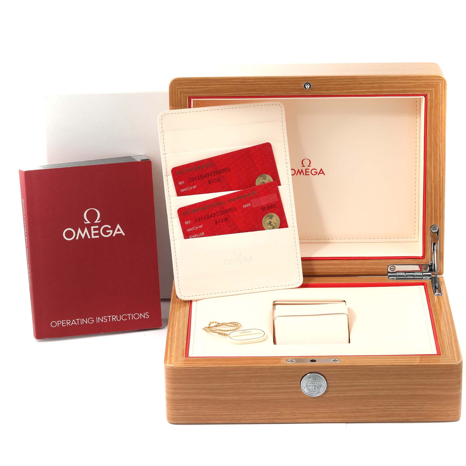 The image shows the packaging and accessories for the Omega Aqua Terra 231.10.43.22.03.001 Men's Stainless Steel Blue Dial 231.10.43.22.03.001 Men's Stainless Steel Blue Dial watch, including the box, instruction manual, and warranty cards.