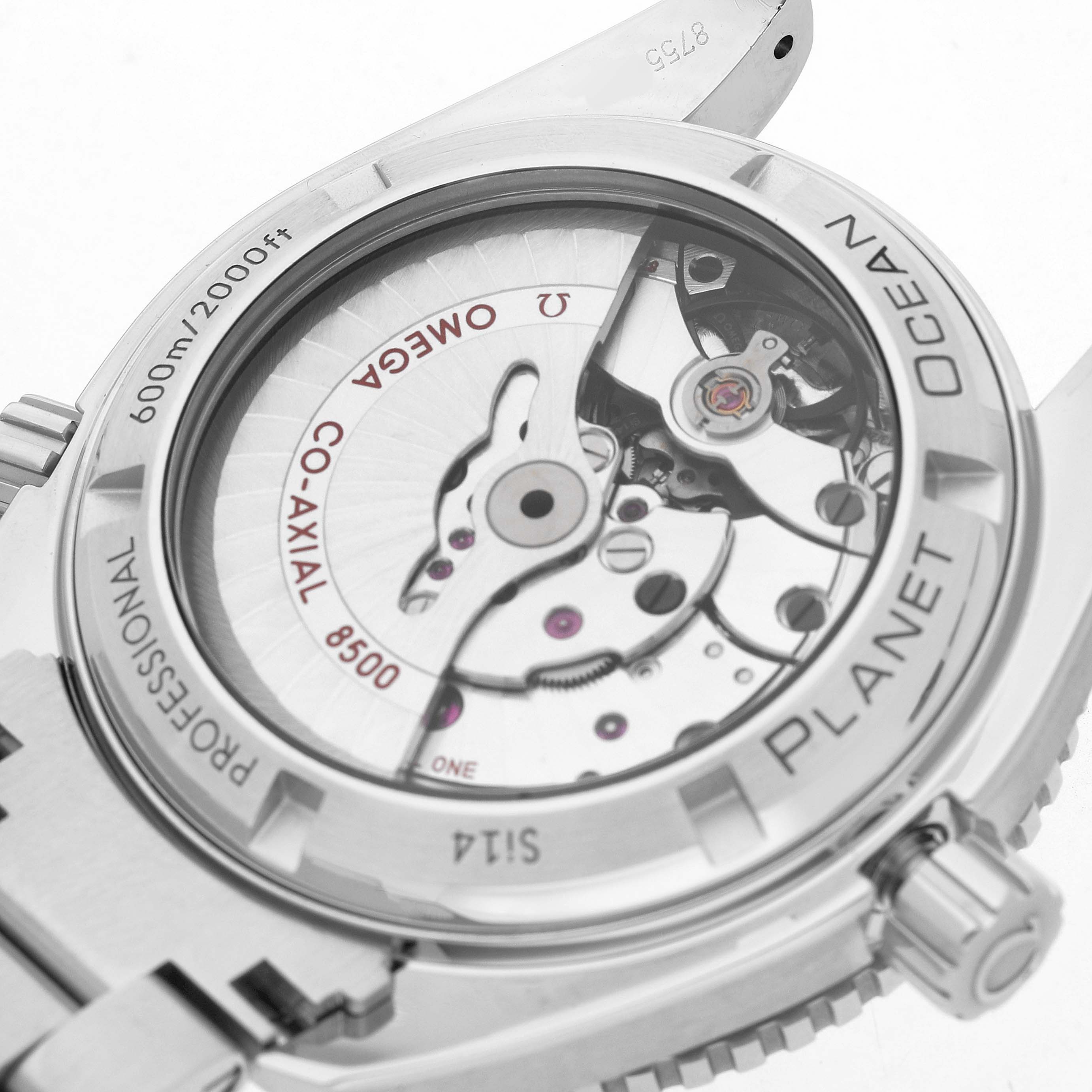 The image shows the back of the Omega Planet Ocean 232.30.42.21.01.003 Men's Stainless Steel Black Dial watch, highlighting its Co-Axial 8500 movement through the transparent case back.