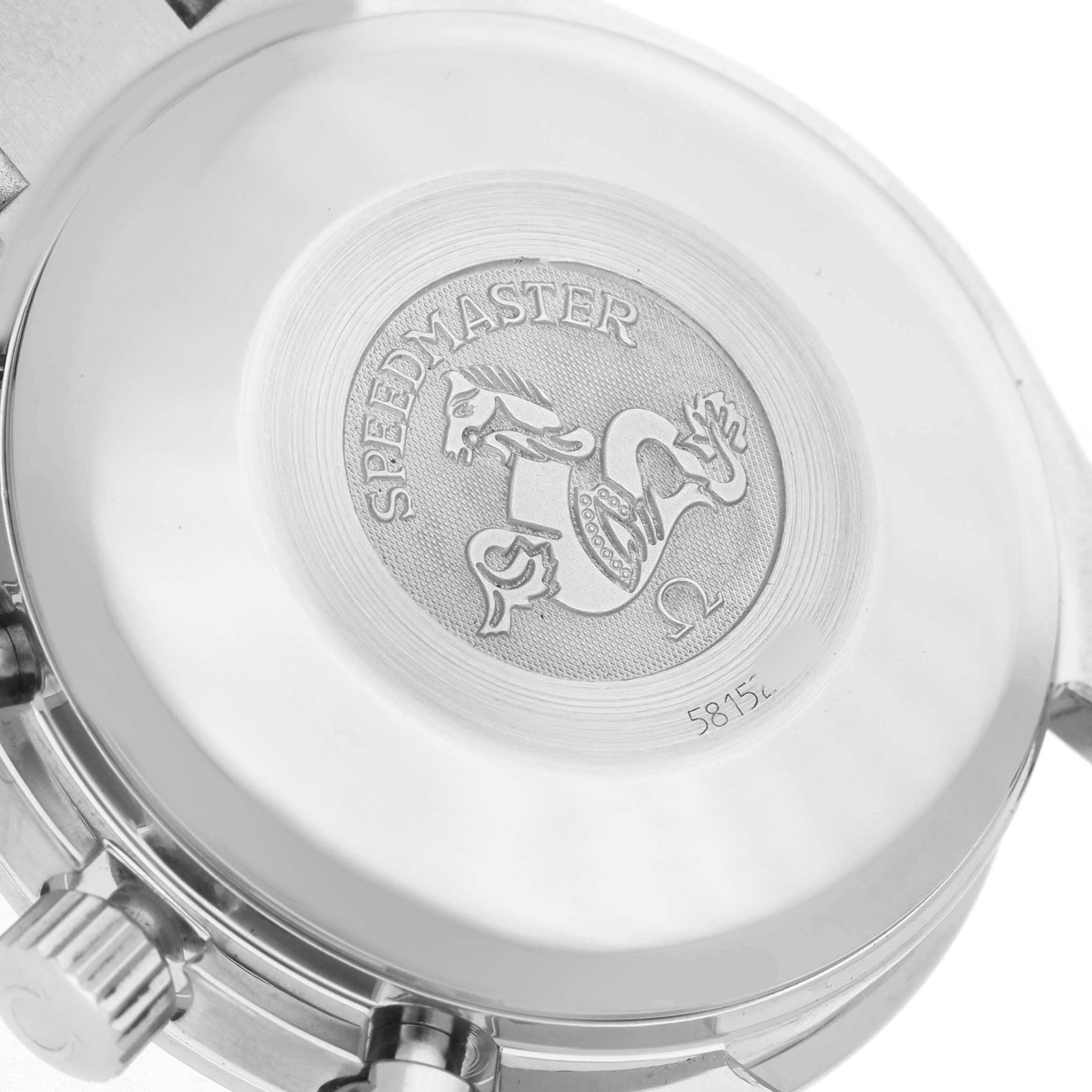 The image shows the case back of an Omega Speedmaster 3513.52.00 Men's Stainless Steel Black Dial watch featuring its engraved logo.