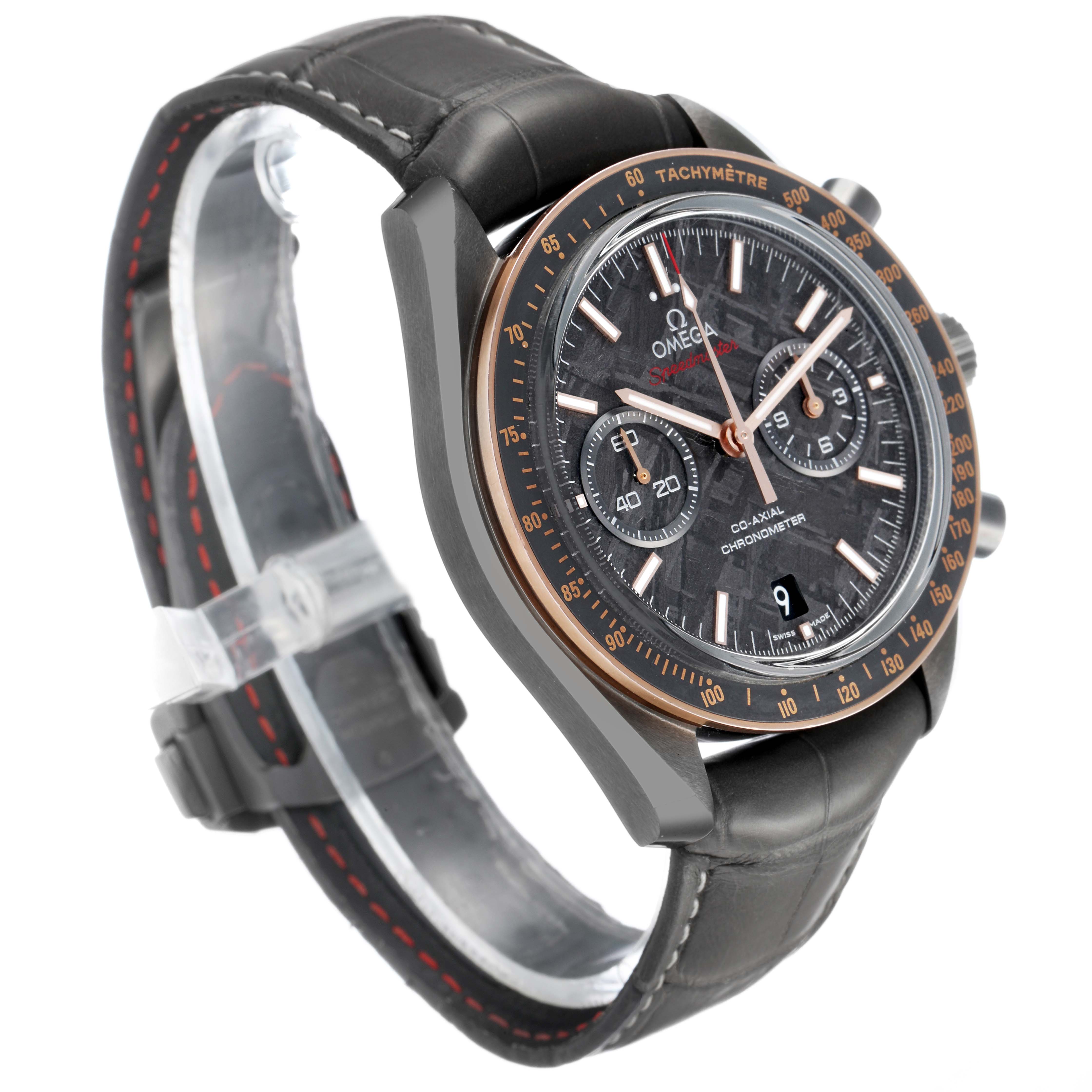 The Omega Speedmaster 311.63.44.51.99.001 Men's Ceramic Grey Dial is shown at a three-quarter angle, highlighting the face, bezel, and strap.