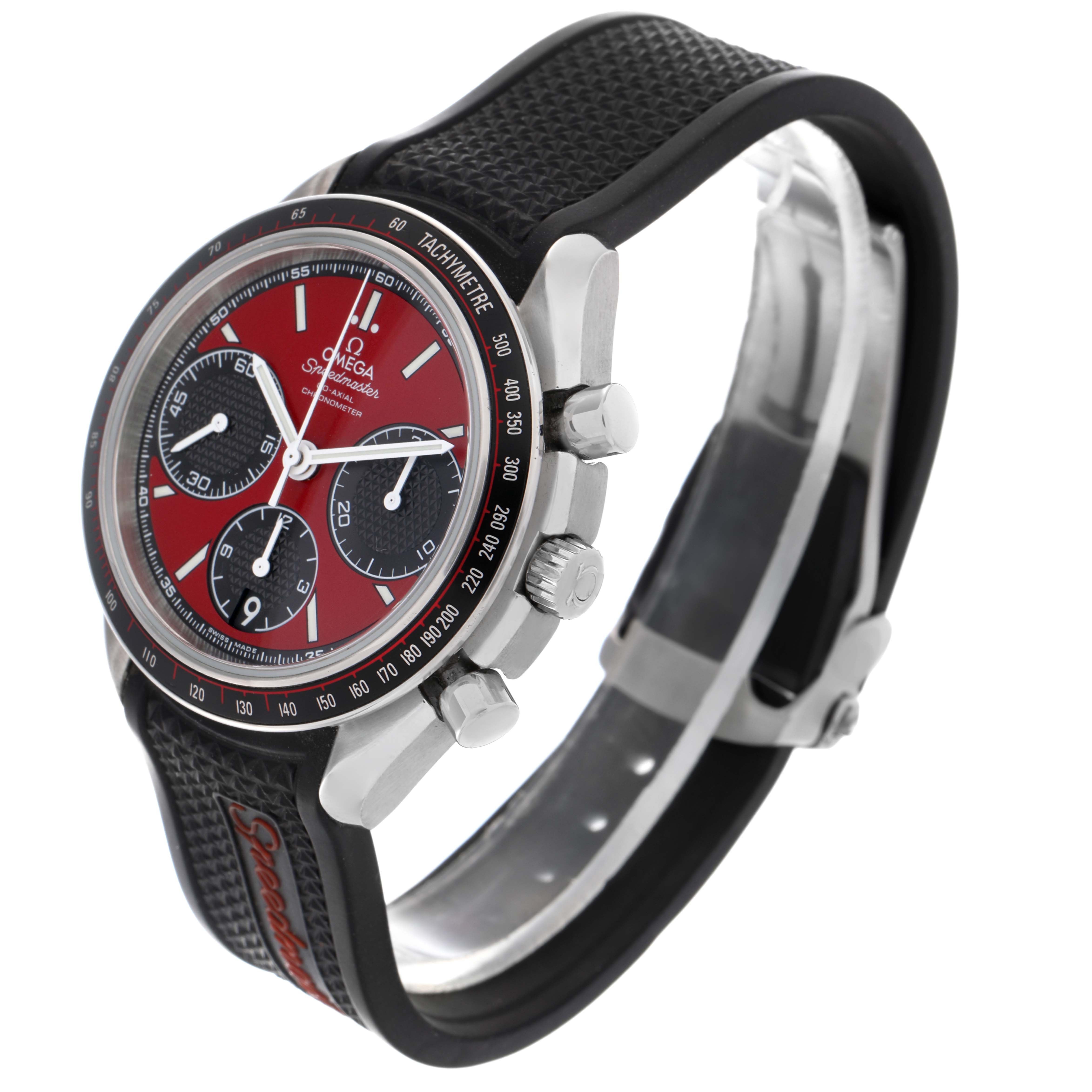 The Omega Speedmaster 326.32.40.50.11.001 Men's Stainless Steel Red Dial 326.32.40.50.11.001 Men's Stainless Steel Red Dial is shown at a side angle highlighting the dial, bezel, crown, pushers, and part of the strap.