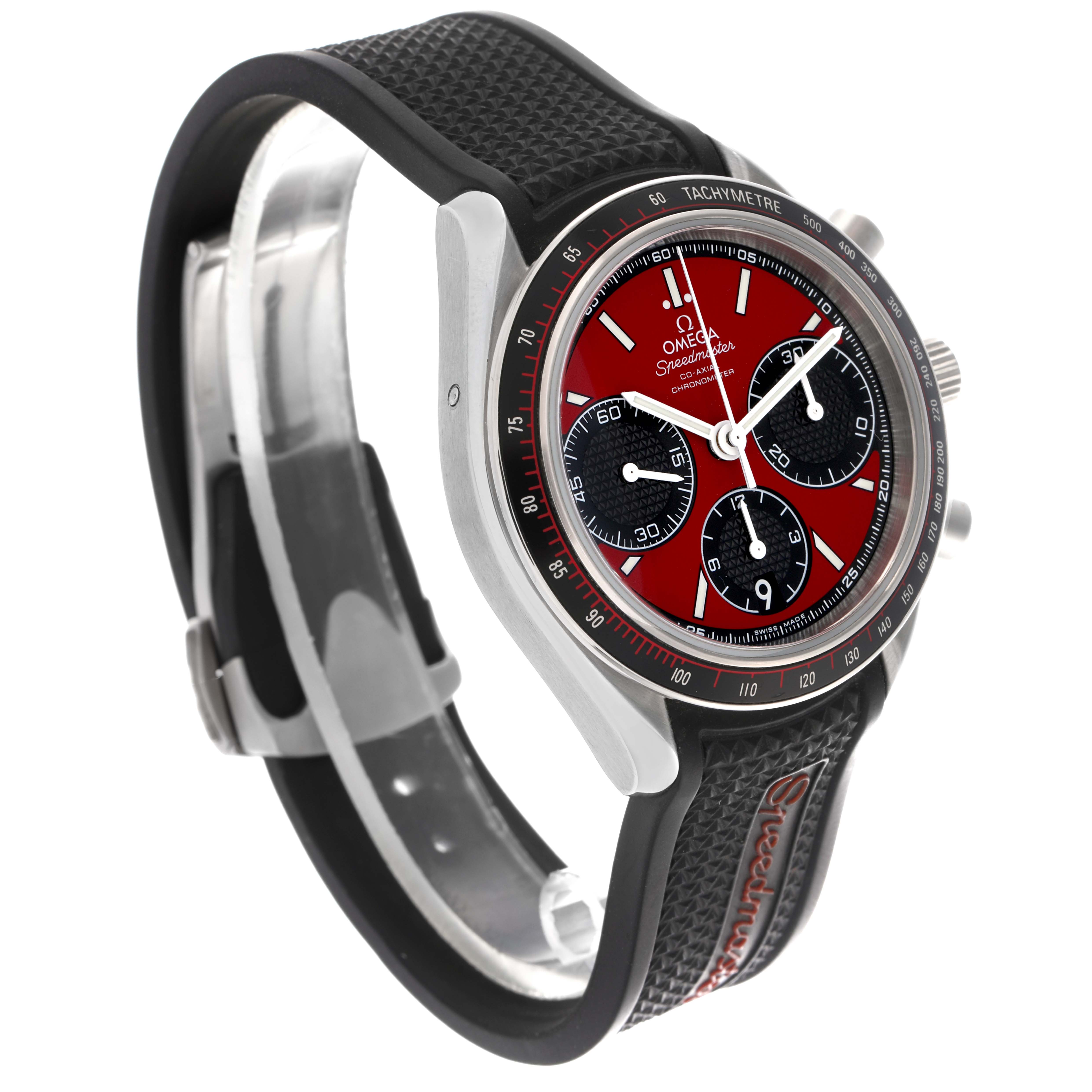 The Omega Speedmaster 326.32.40.50.11.001 Men's Stainless Steel Red Dial 326.32.40.50.11.001 Men's Stainless Steel Red Dial watch is shown from a side angle, displaying the dial, bezel, pushers, and rubber strap.