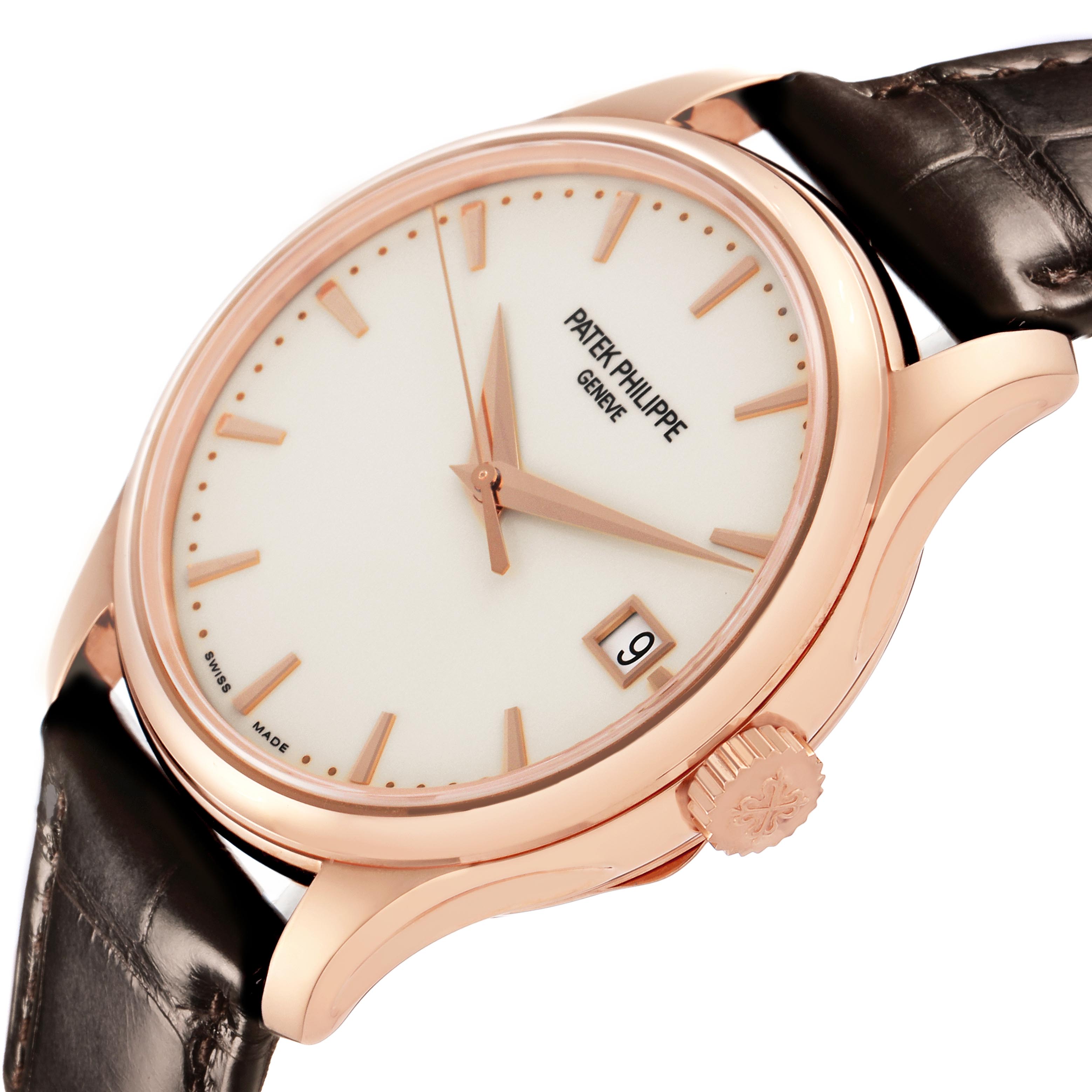 The Patek Philippe Calatrava 5227R-001 Men's Rose Gold White Dial 5227R-001 Men's Rose Gold White Dial watch is shown at an angle highlighting its face, crown, date window, and leather strap.