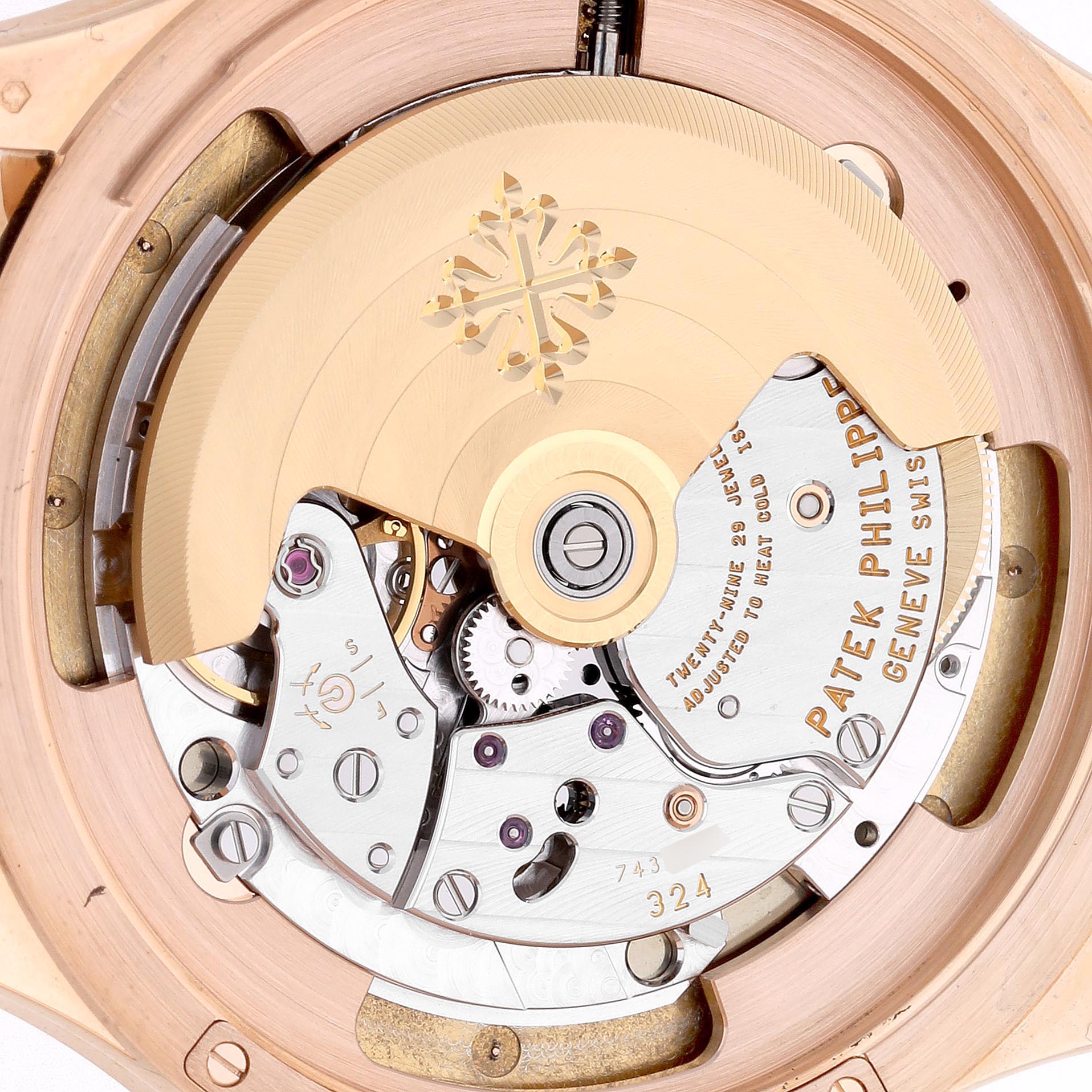 The image shows the movement and rotor of a Patek Philippe Calatrava 5227R-001 Men's Rose Gold White Dial 5227R-001 Men's Rose Gold White Dial watch viewed from the back.