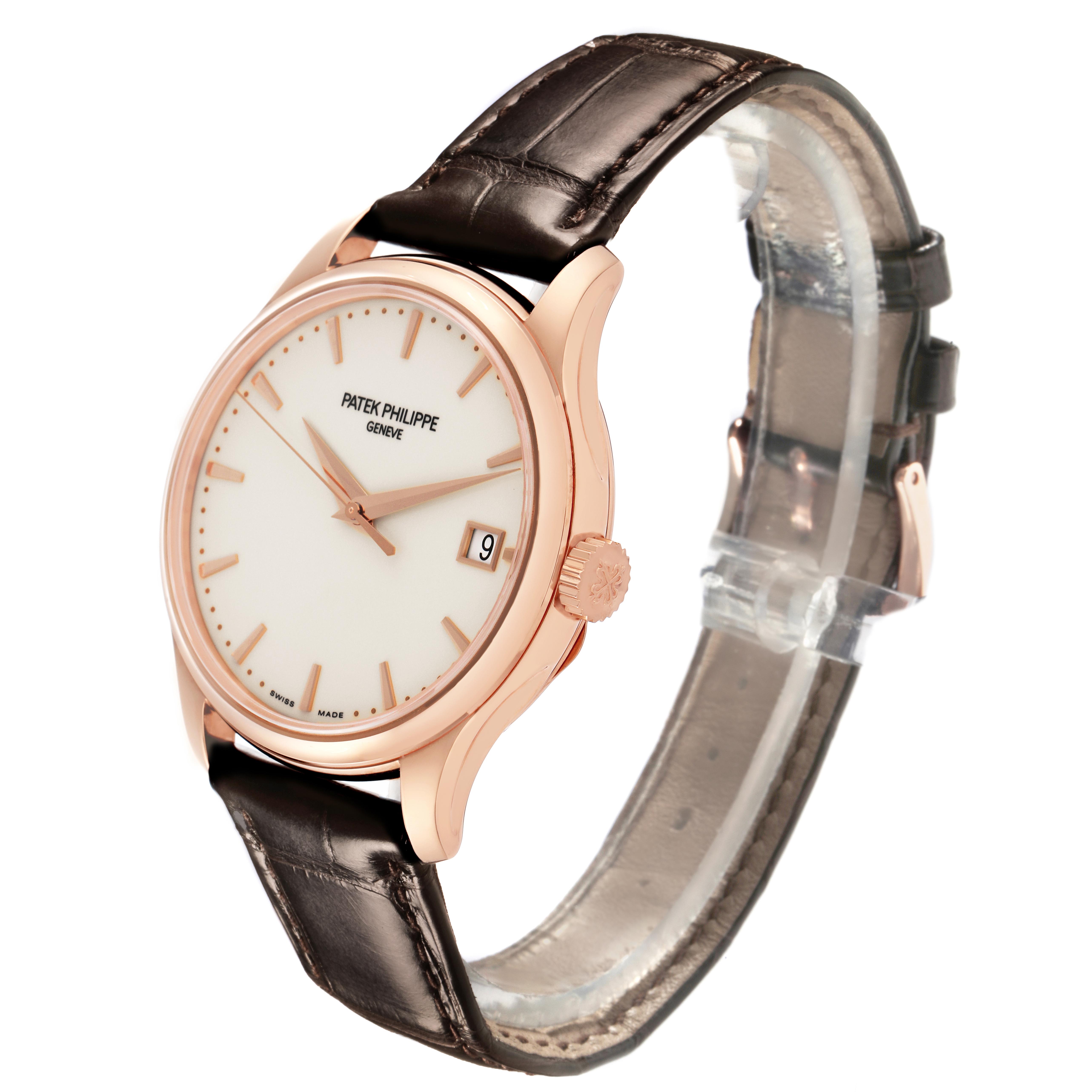 The Patek Philippe Calatrava 5227R-001 Men's Rose Gold White Dial 5227R-001 Men's Rose Gold White Dial watch is shown at a three-quarter angle, displaying the dial, case, crown, and leather strap.