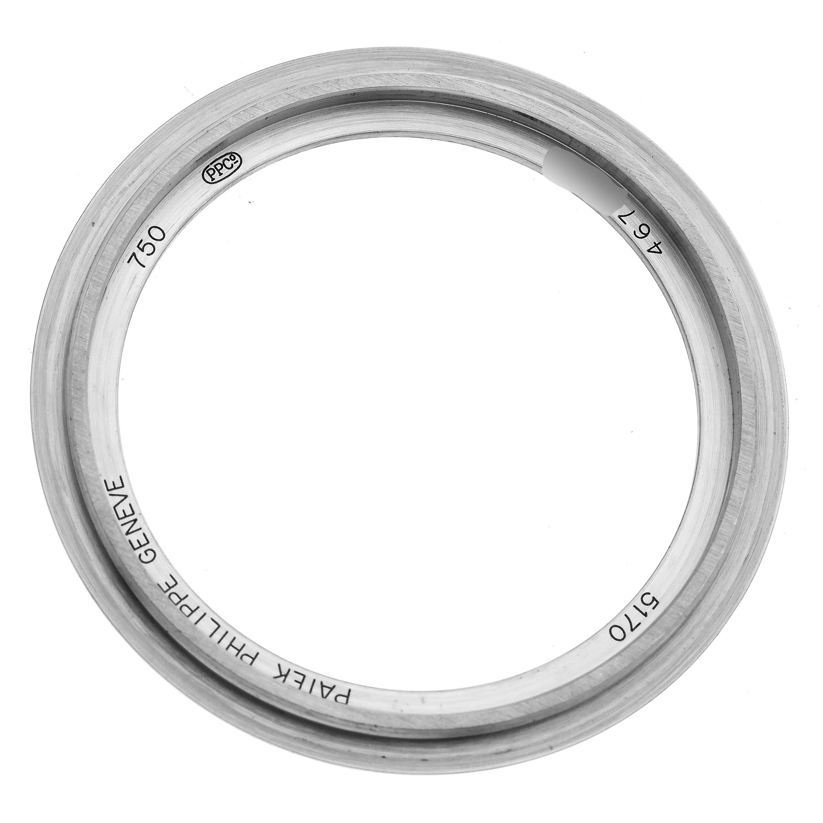 The image shows a top-down view of a bezel for a Patek Philippe Complications 5170G-001 Men's White Gold Silver Dial 5170G-001 Men's White Gold Silver Dial model watch, displaying engravings and model details.