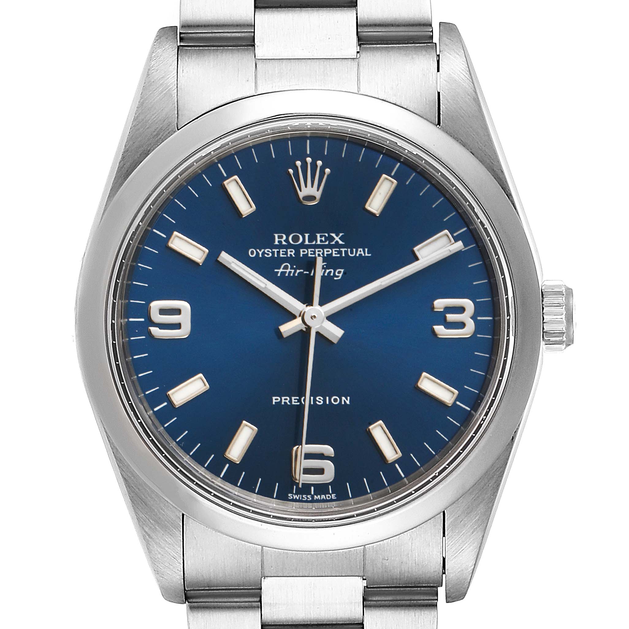 The image shows a close-up of a Rolex Air-King 14000 Men's Stainless Steel Blue Dial 14000 Men's Stainless Steel Blue Dial watch face and part of the metal bracelet.