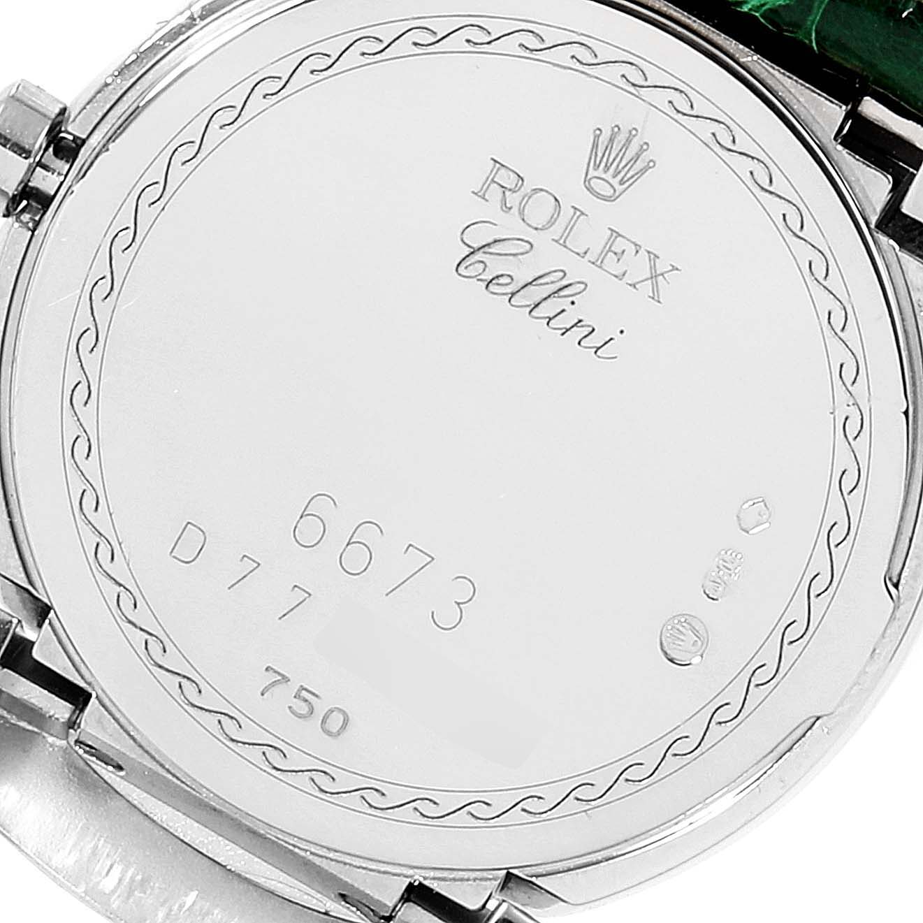 The image shows the back case of the Rolex Cellini 6673 Women's Stainless Steel Silver Dial 6673 Women's Stainless Steel Silver Dial model watch, featuring the brand's engraving and serial numbers.