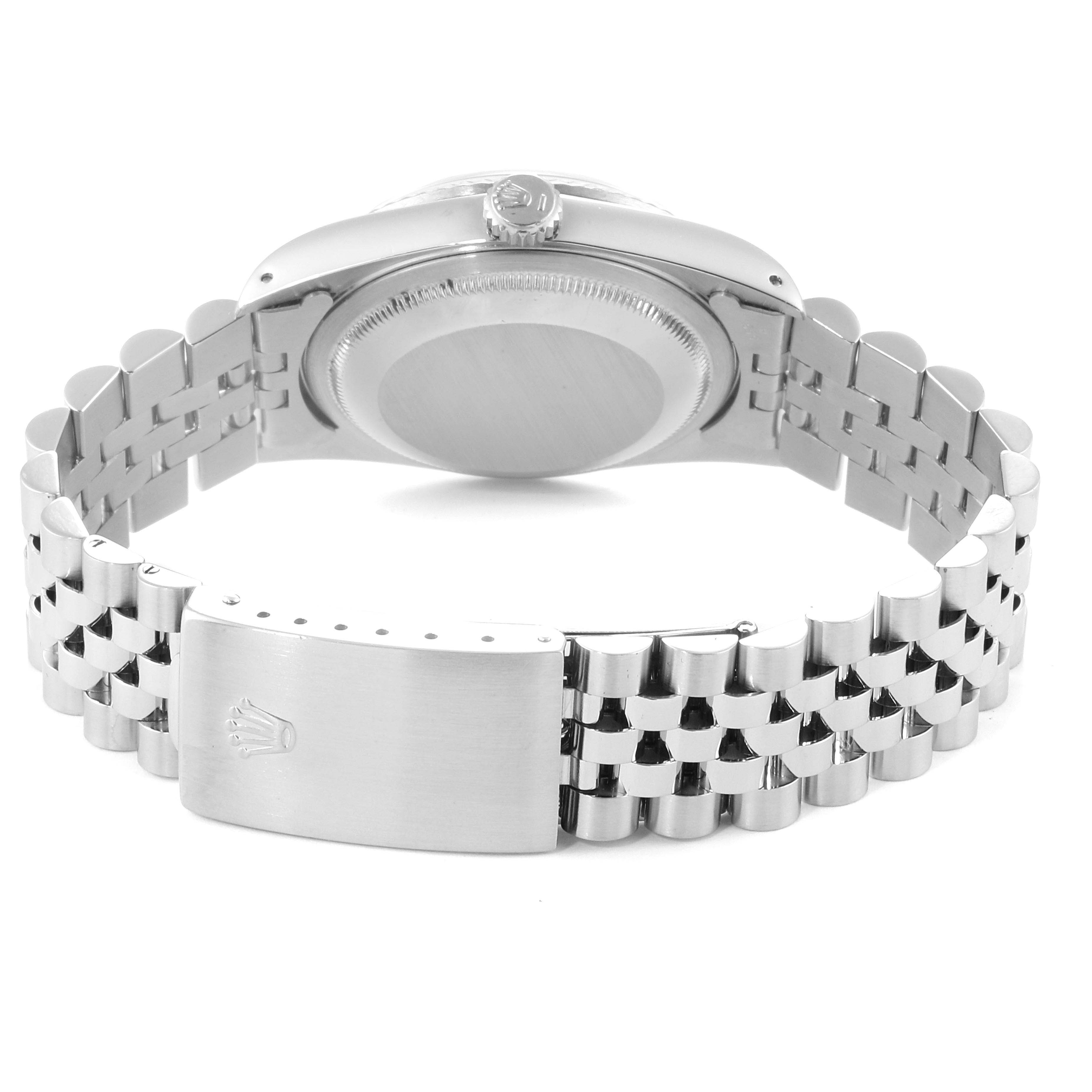 The image shows the back view of a Rolex Datejust 16234 Men's Stainless Steel Silver Dial 16234 Men's Stainless Steel Silver Dial watch, highlighting its caseback, crown, and Jubilee bracelet.