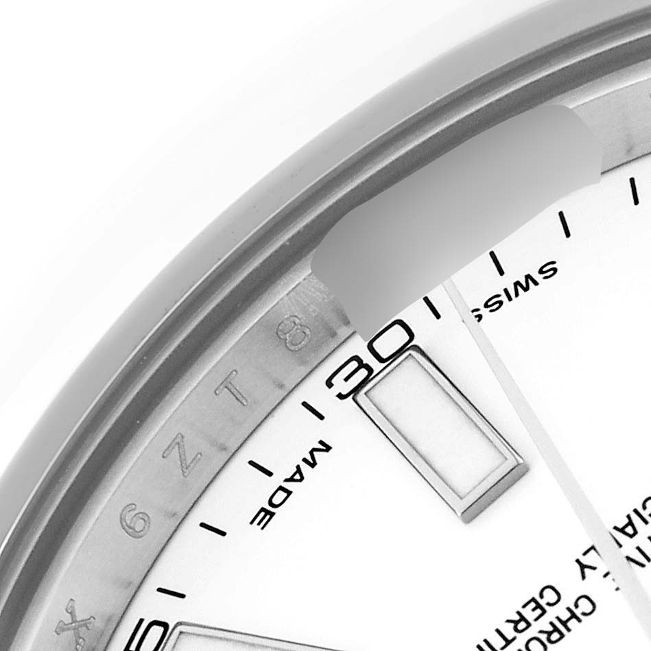 This image shows a close-up of the Rolex Datejust 116300 Men's Stainless Steel White Dial watch's dial, focusing on the 30-minute marker and some text.