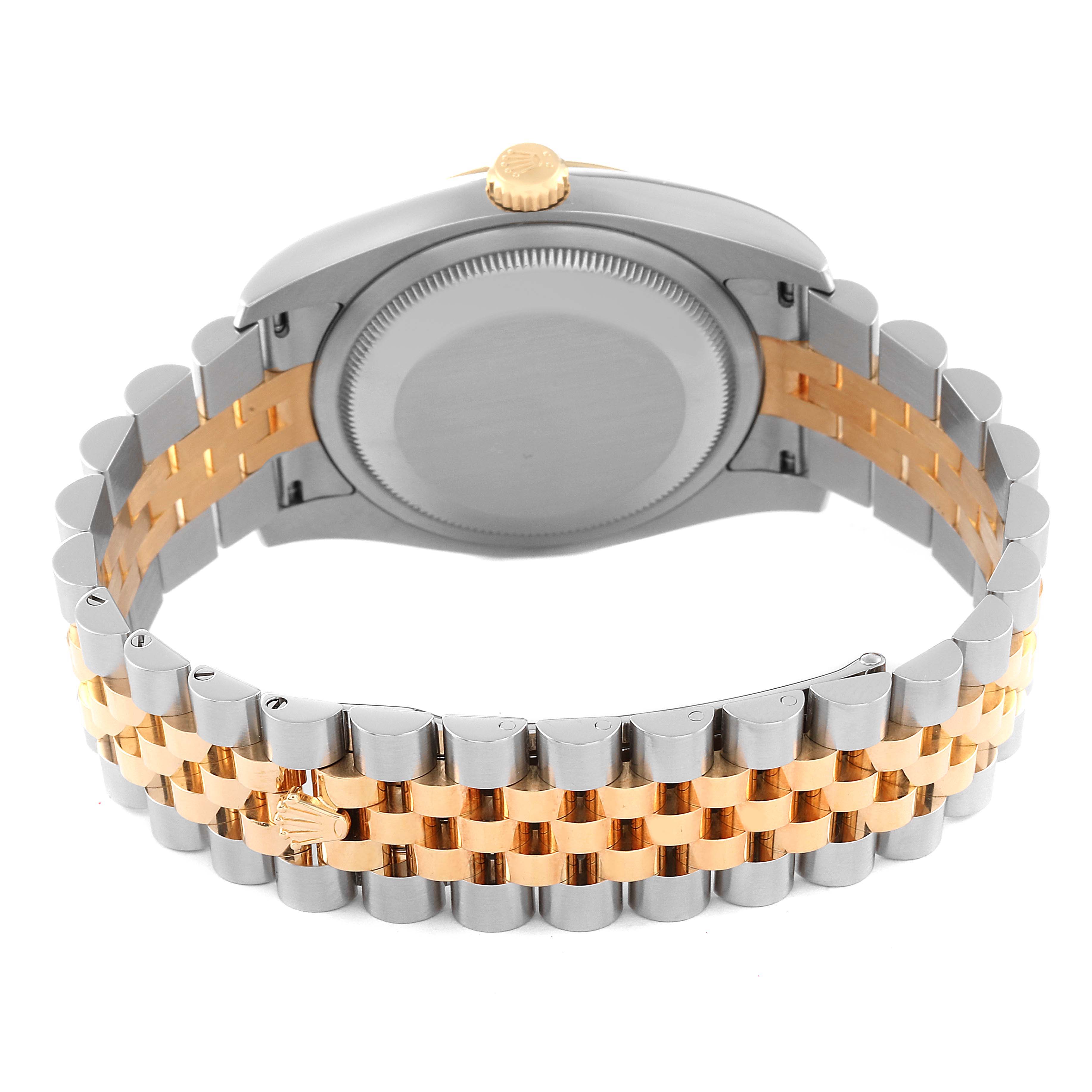 This Rolex Datejust 116233 Men's Steel and Gold (two tone) Black Dial 116233 Men's Steel and Gold (two tone) Black Dial watch is shown from the back, highlighting its two-tone bracelet and caseback.