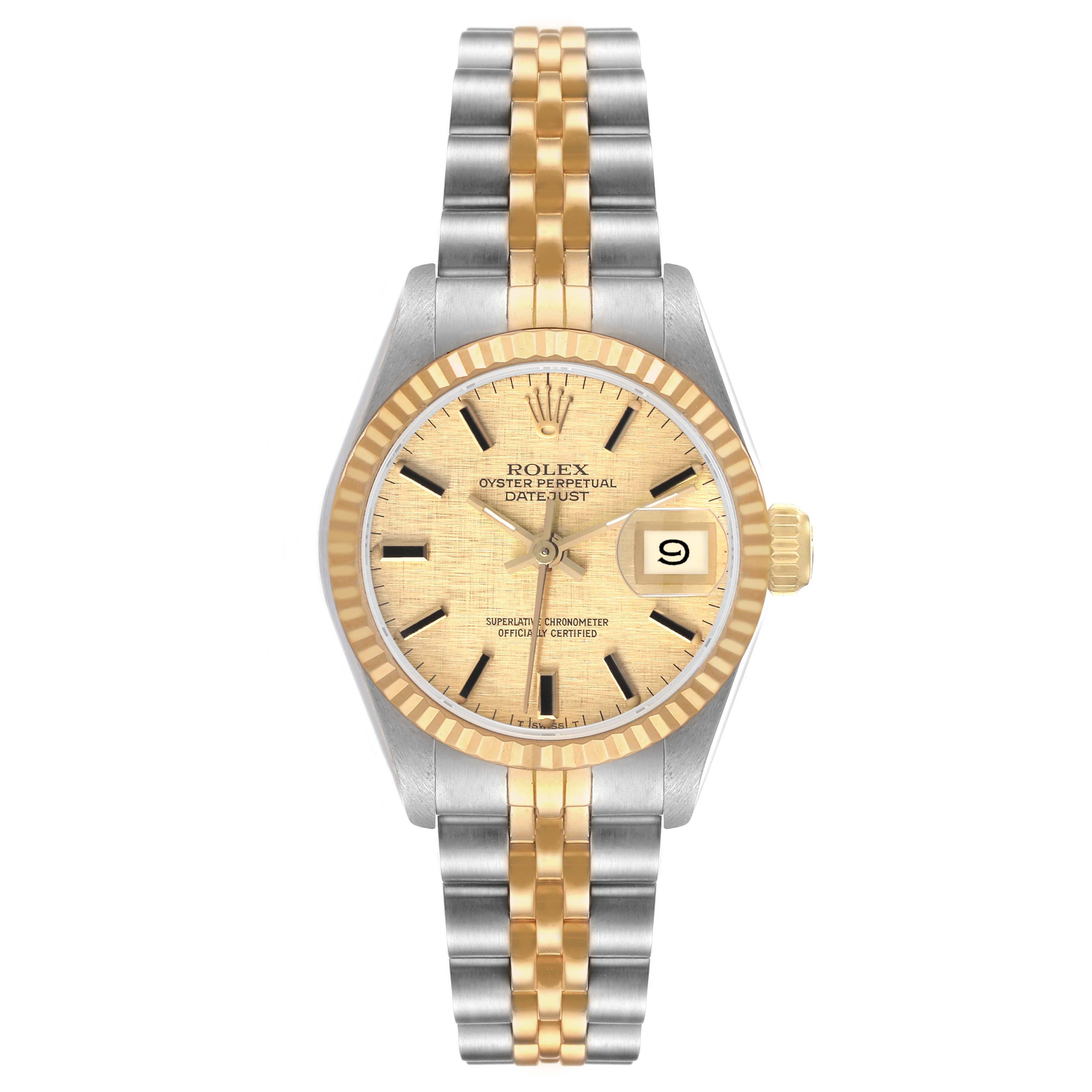 The Rolex Datejust 69173 Women's Steel and Gold (two tone) Champagne Dial watch is shown from a front angle, displaying its dial, bezel, and two-tone bracelet.