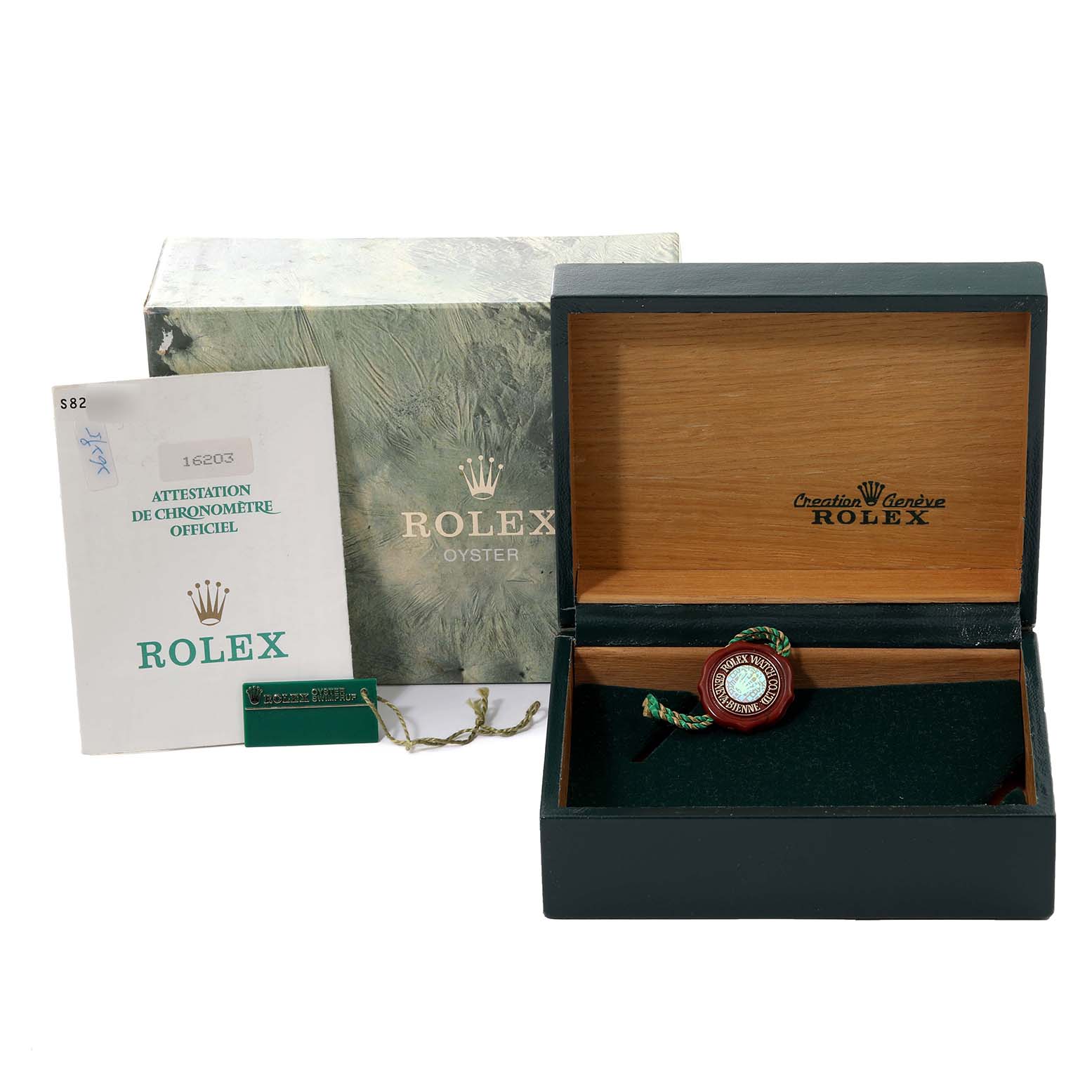The image shows a Rolex Datejust 16203 Men's Steel and Gold (two tone) Grey Dial 16203 Men's Steel and Gold (two tone) Grey Dial packaging, including the box, papers, tag, and manual, from a front angle.