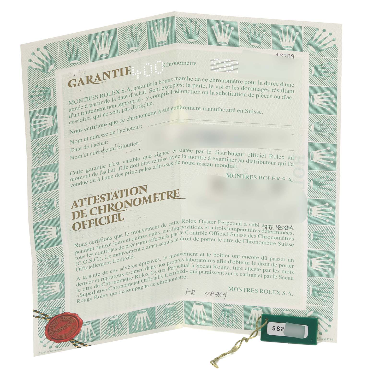This image shows the certificate and tag of the Datejust model by Rolex, including warranty and chronometer attestation details.