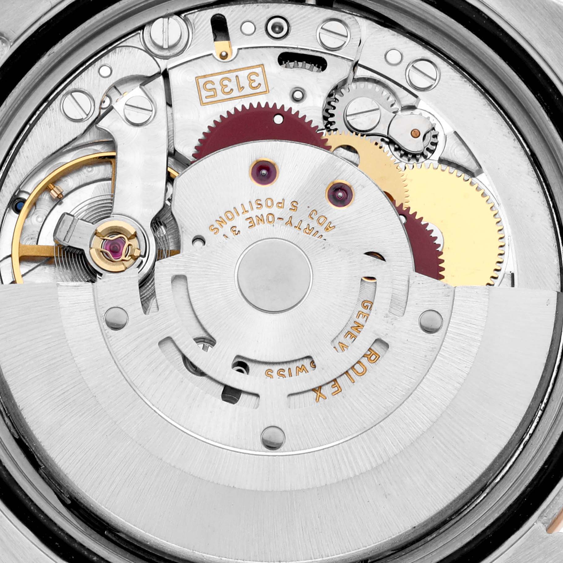 The image shows a close-up view of the internal mechanical movement of a Rolex Turn-o-Graph 116261 Men
s Steel and Gold (two tone) White Dial 116261 Men
s Steel and Gold (two tone) White Dial watch, highlighting gears and components.