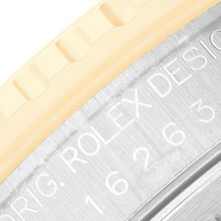 This close-up image shows the bezel and engraved case back of a Rolex Turn-o-Graph 16263 Men's Steel and Gold (two tone) Beige Dial 16263 Men's Steel and Gold (two tone) Beige Dial watch.