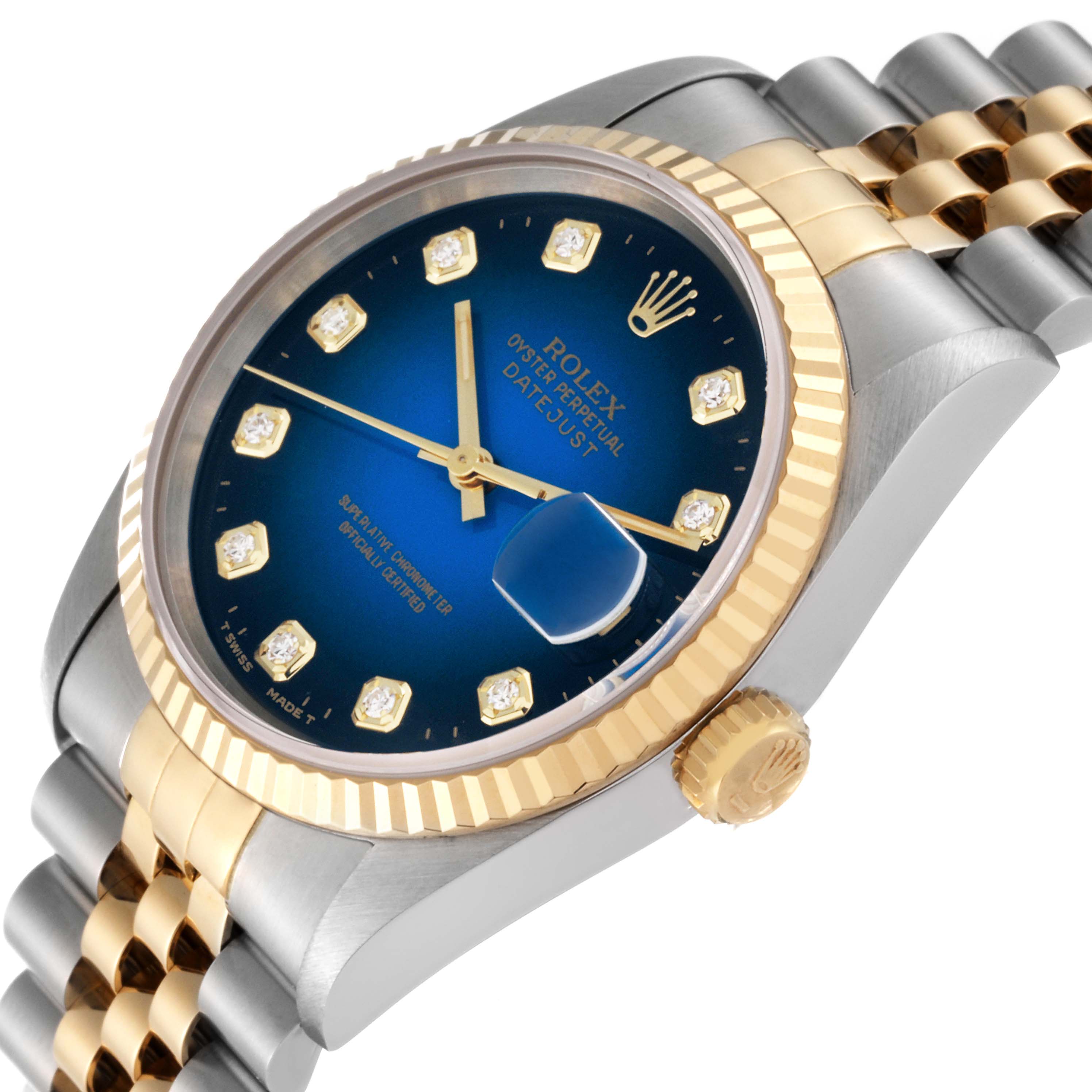 This image shows a Rolex Datejust 16233 Men's Steel and Gold (two tone) Blue Dial 16233 Men's Steel and Gold (two tone) Blue Dial watch at a three-quarter angle, highlighting the blue dial, fluted bezel, crown, and two-tone bracelet.