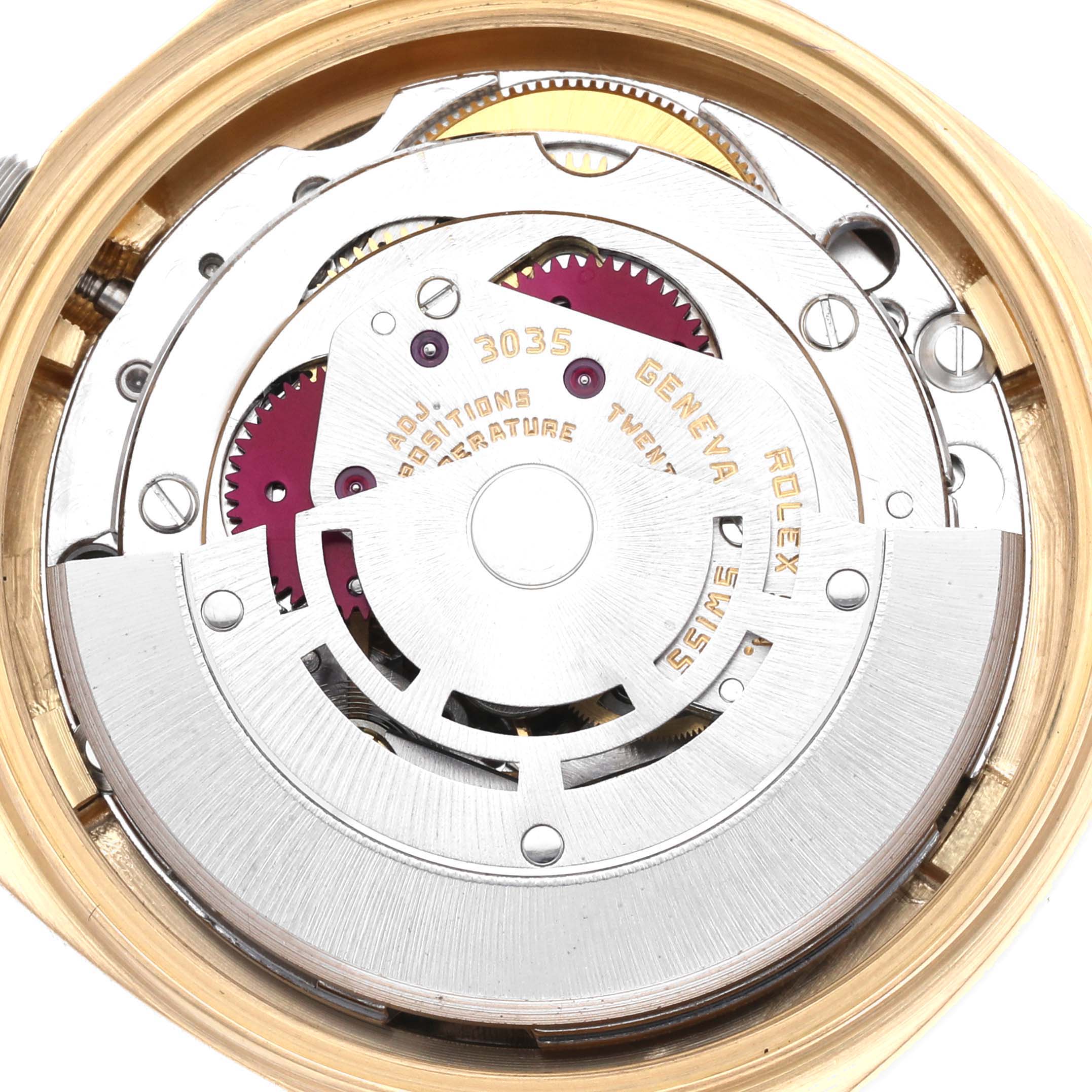 This close-up image shows the intricate internal mechanics of a Vintage Collection Rolex watch, highlighting gears and components.