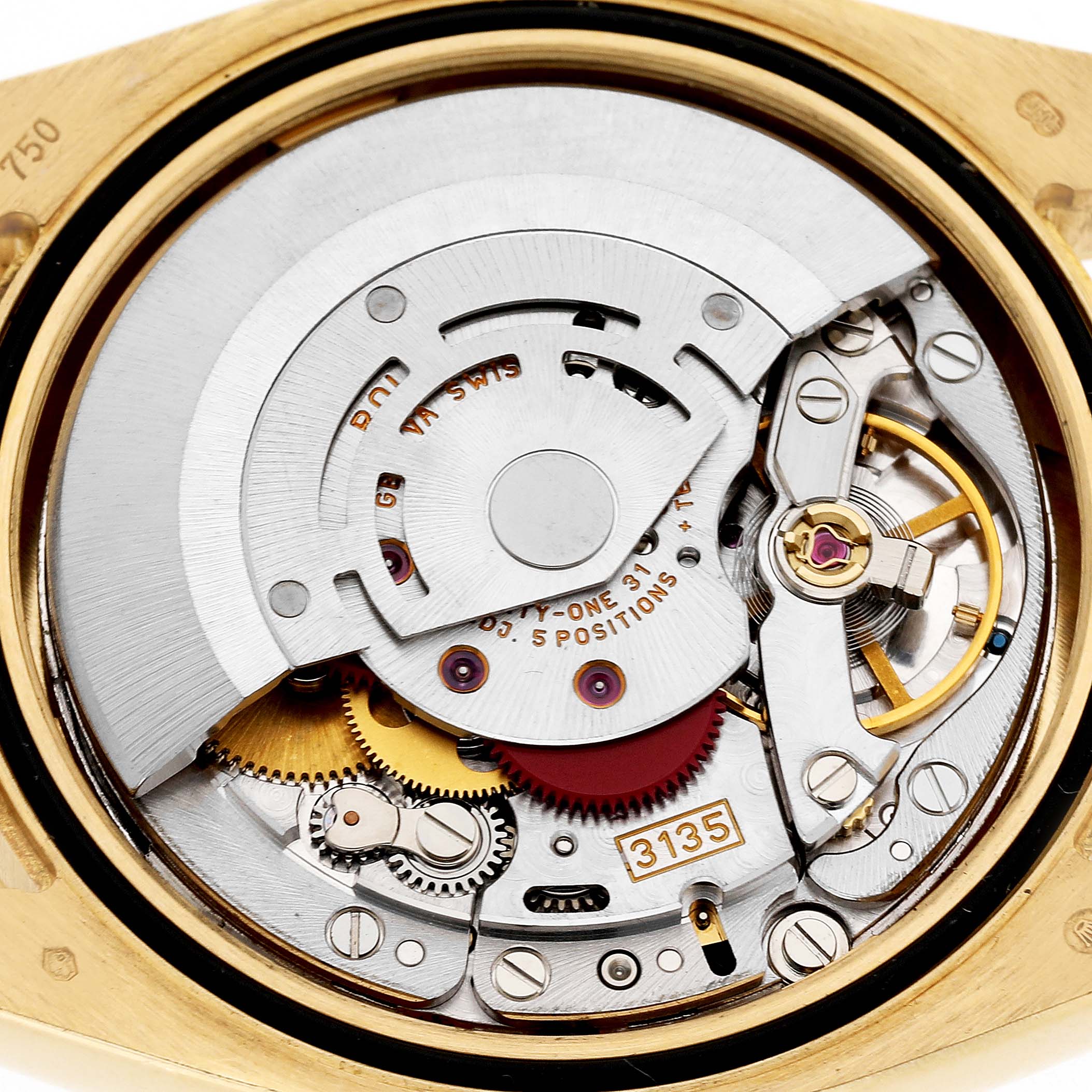 The image shows the movement of a Rolex Datejust 116208 Men's Yellow Gold Champagne Dial watch, displaying its intricate mechanical components from a top angle.