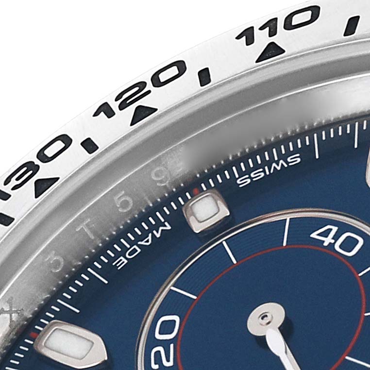 The image shows a close-up of the bezel and part of the dial of a Rolex Daytona 116509 Men's White Gold Blue Dial 116509 Men's White Gold Blue Dial watch.