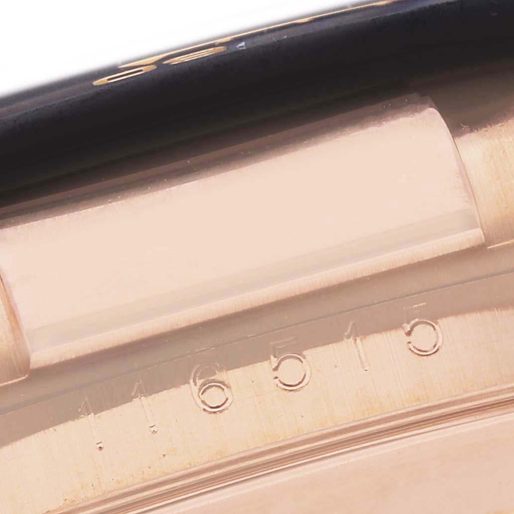 The image shows a close-up of the Rolex Daytona 116515 Men's Rose Gold Brown Dial model's side, featuring part of the bezel and engraved serial number.