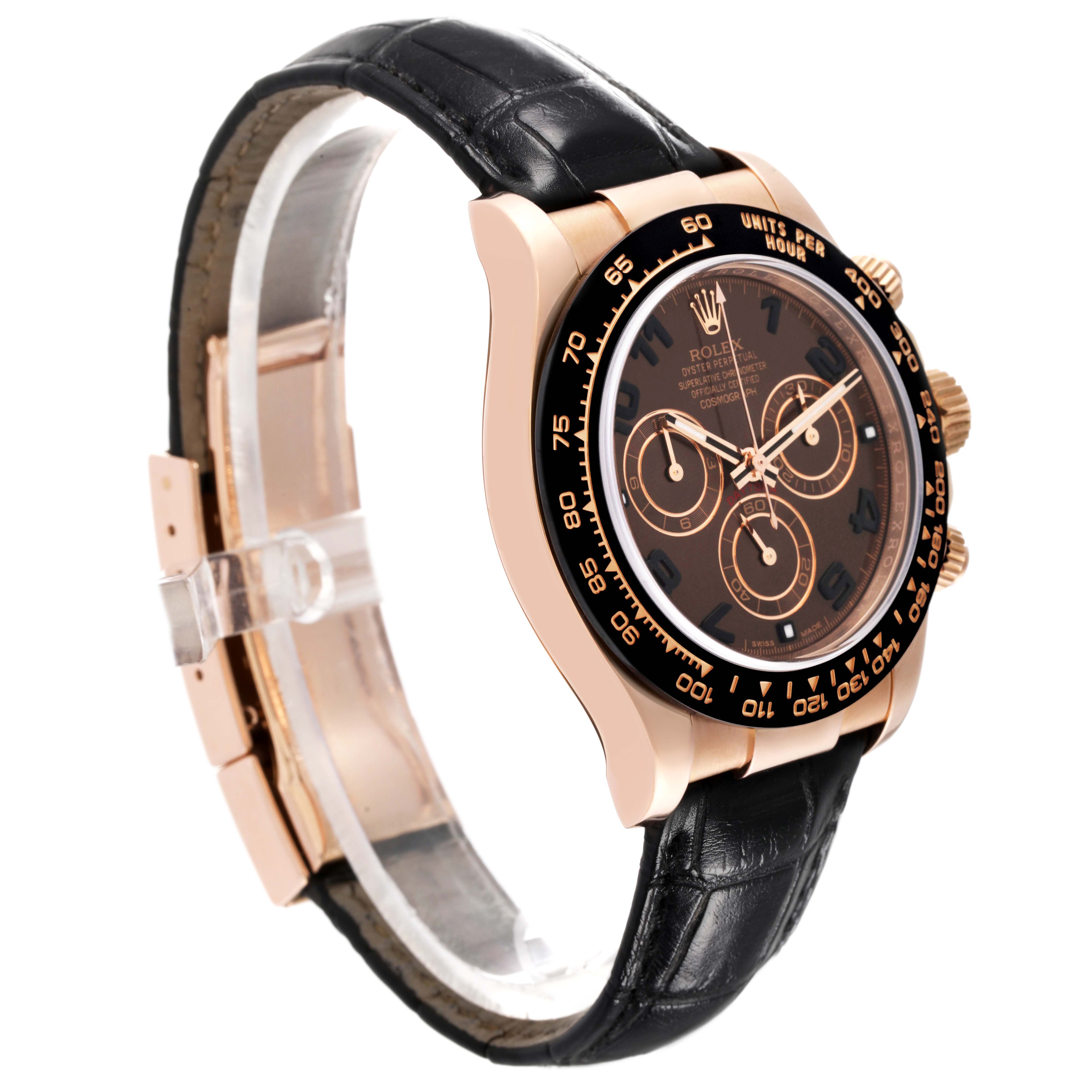 The Rolex Daytona 116515 Men's Rose Gold Brown Dial watch is shown from a side angle, highlighting its rose gold case, black bezel, and leather strap.