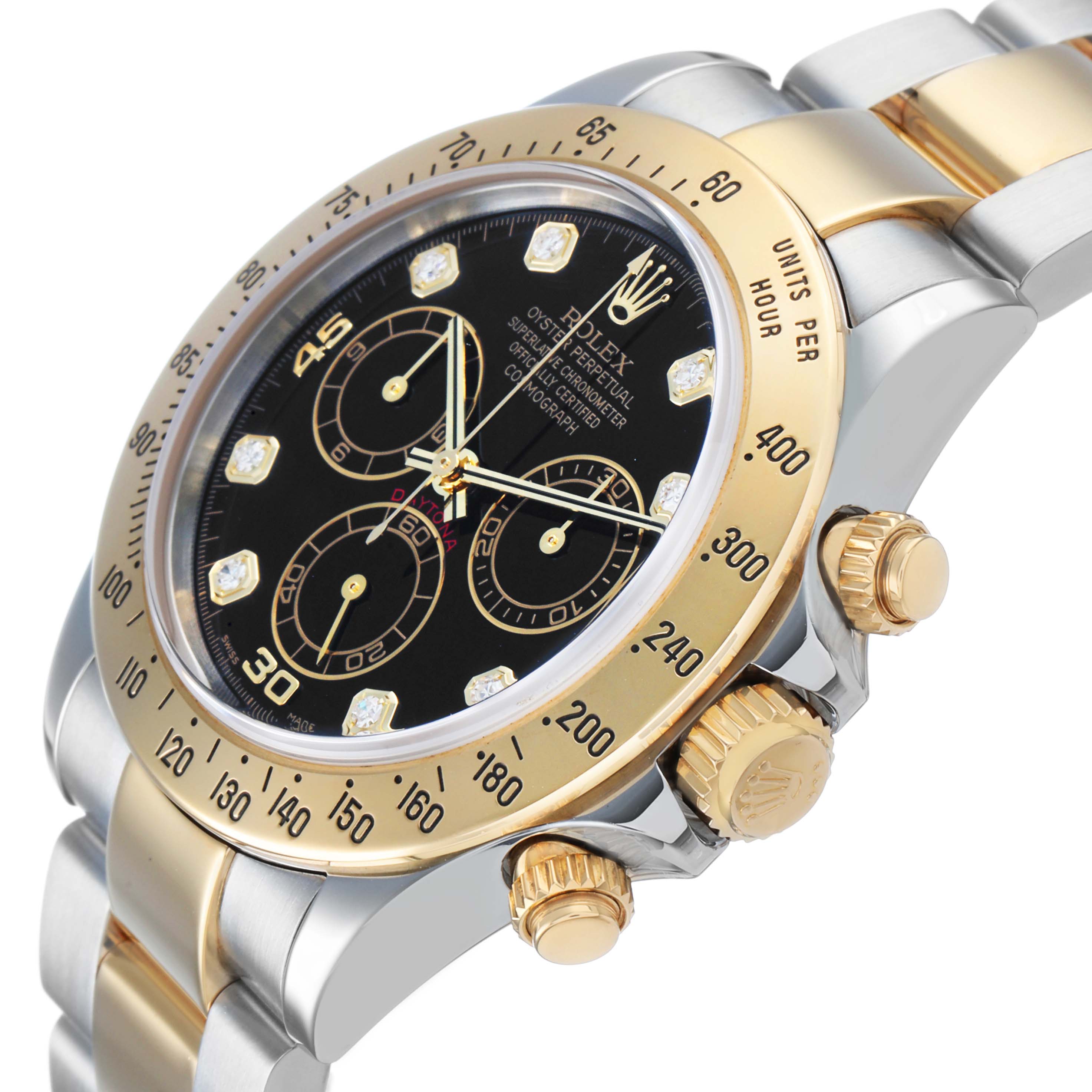 The Rolex Daytona 116523 Men's Steel and Gold (two tone) Black Dial watch is shown at an angle displaying the bezel, crown, pushers, and bracelet with gold accents.