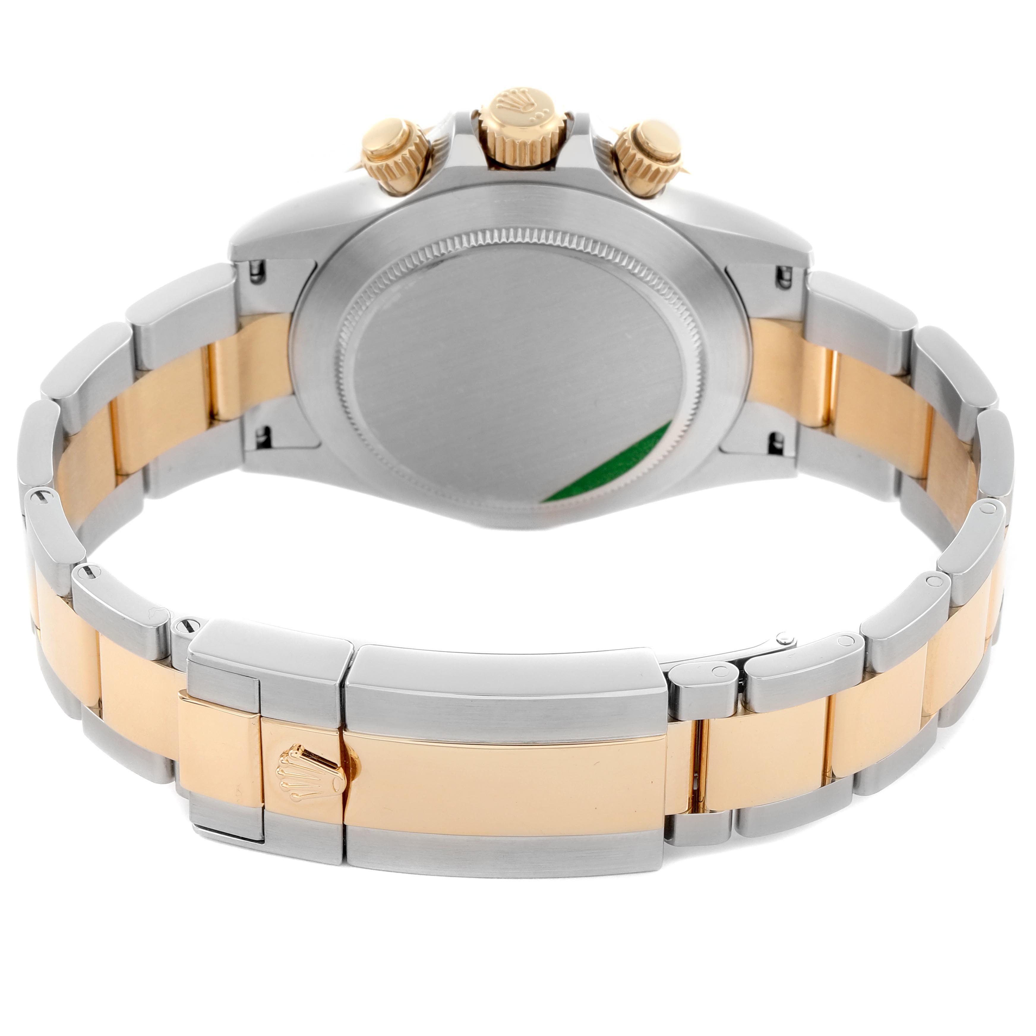 This image shows the back view of a Rolex Daytona 116503 Men's Steel and Gold (two tone) Mother of Pearl Dial 116503 Men's Steel and Gold (two tone) Mother of Pearl Dial watch, highlighting the case back, crown, pushers, and two-tone bracelet.