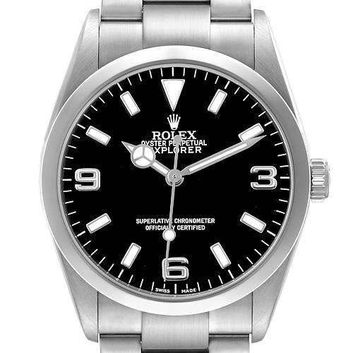 The image shows a front view of a Rolex Explorer 114270 Men's Stainless Steel Black Dial watch, highlighting the dial, bezel, and part of the bracelet.