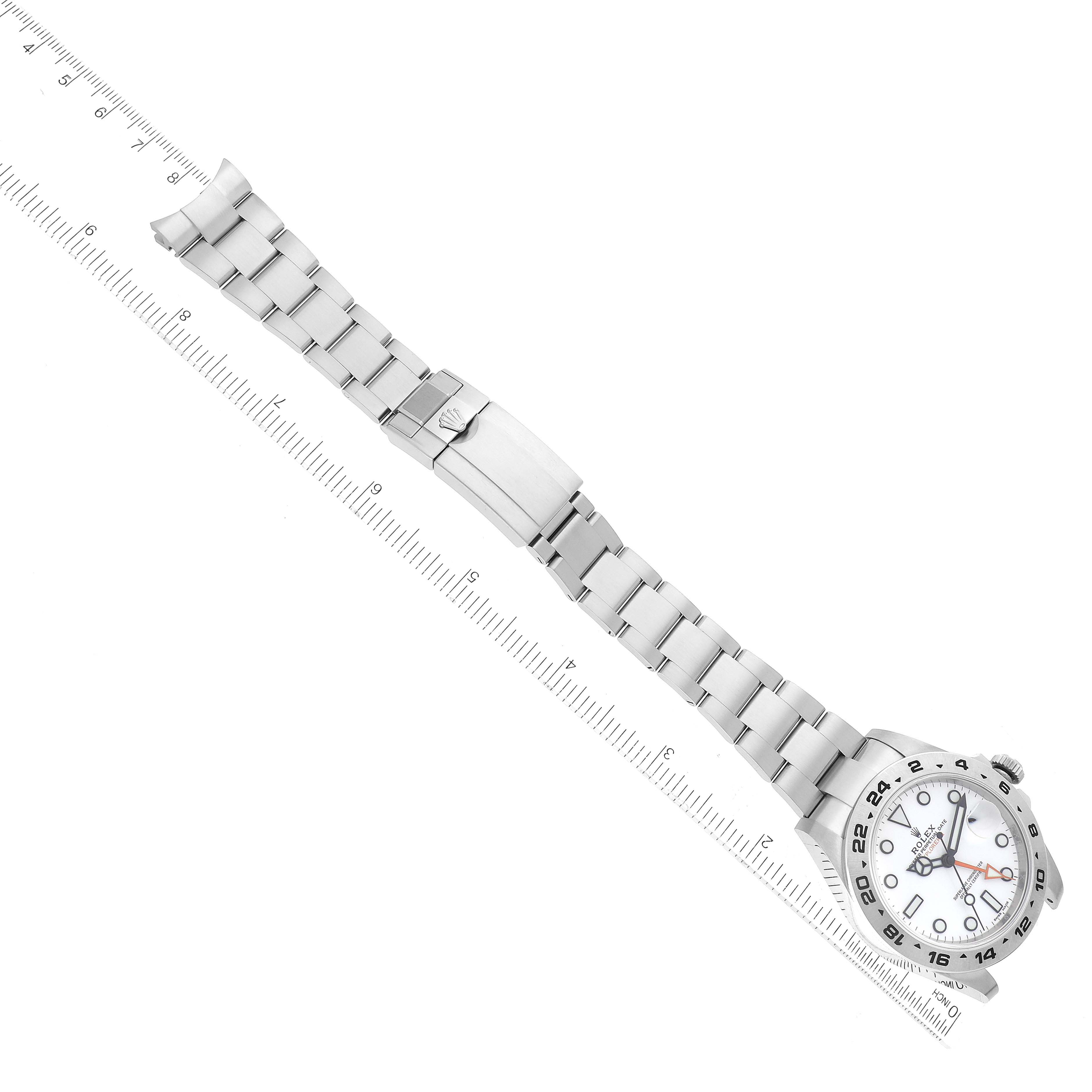 The image shows the face, bezel, crown, and stainless steel bracelet of a Rolex Explorer 216570 Men's Stainless Steel White Dial 216570 Men's Stainless Steel White Dial watch at a slight diagonal angle.